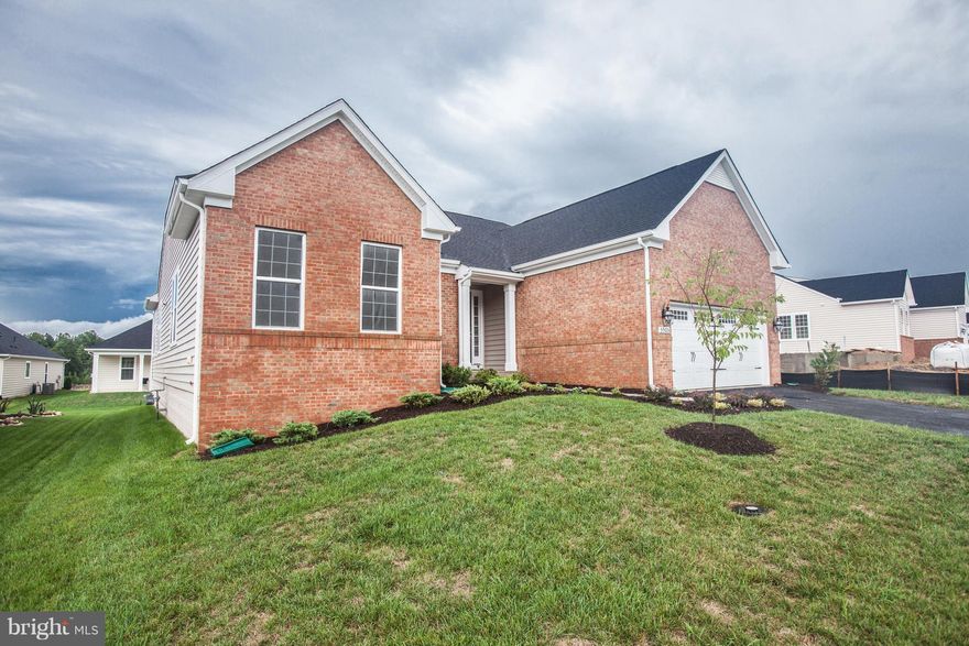 READY NOW!  This stunning new Abingdon offers spacious Great Room living with designer gourmet Kitchen, gas fireplace,wide plank flooring, island and Sun Room. The split bedroom design provides 3 main level bedrooms and 2.5 baths.  This model offers a finished basement with den, storage and full bath.  All well appointed with Lennar's Gold Level designer package. Save over 33,000 now!