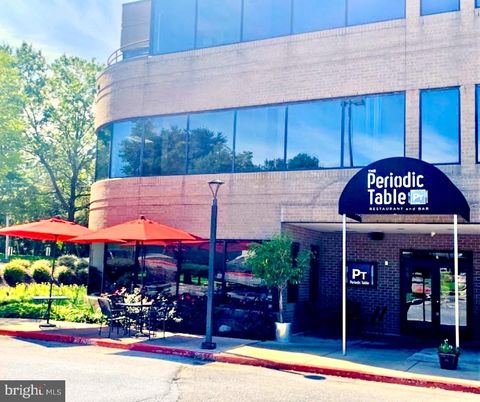 Photo of 8808 Centre Park Drive, COLUMBIA, MD 21045 (MLS # MDHW2060738)