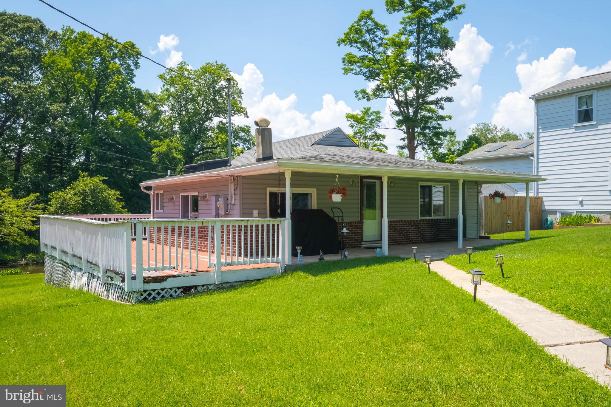 Welcome to Your Own Waterfront Oasis in Cedar Beach!
This charming rancher is tucked away in a quiet neighborhood and offers 75 feet of waterfront—perfect for launching kayaks or jet skis and enjoying peaceful water views right from your backyard.
Inside, you'll find 2 comfortable bedrooms, including a spacious primary with ample closet space. The open floor plan is bright and welcoming, featuring many updates throughout. The property sits on just under a quarter acre, giving you a great balance of space and low-maintenance living.
Recent Improvements Include:
Roof replaced in 2021
New parking pad
Water line replaced in 2018
Updated plumbing
Trees professionally trimmed
Please Note:
The deck is in need of replacement and will be sold AS IS—the seller is not in a position to make repairs.
Property consists of two tax records. Please refer to disclosures for full detail