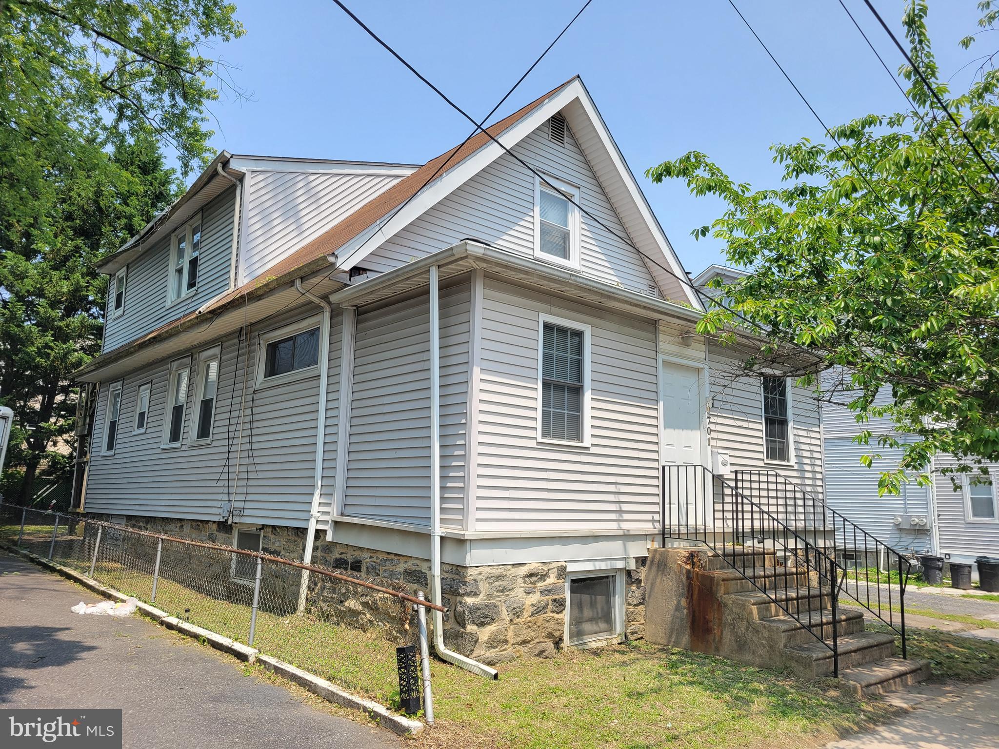 Investor Alert! Great duplex with two bedroom 1st floor unit and two bedroom 2nd floor unit. Driveway parking with oversized detached garage with electric garage door opener, rear yard. Enclosed front porch entryway for 1st floor unit, spacious living room and dining room area, opens up to eat in kitchen and 2 bedrooms. Large basement, great for storage. 2nd floor unit has hardwoods throughout, main bedroom needs a new floor laid, large living room and outdoor 2nd level deck. Being sold in as-is condition.
