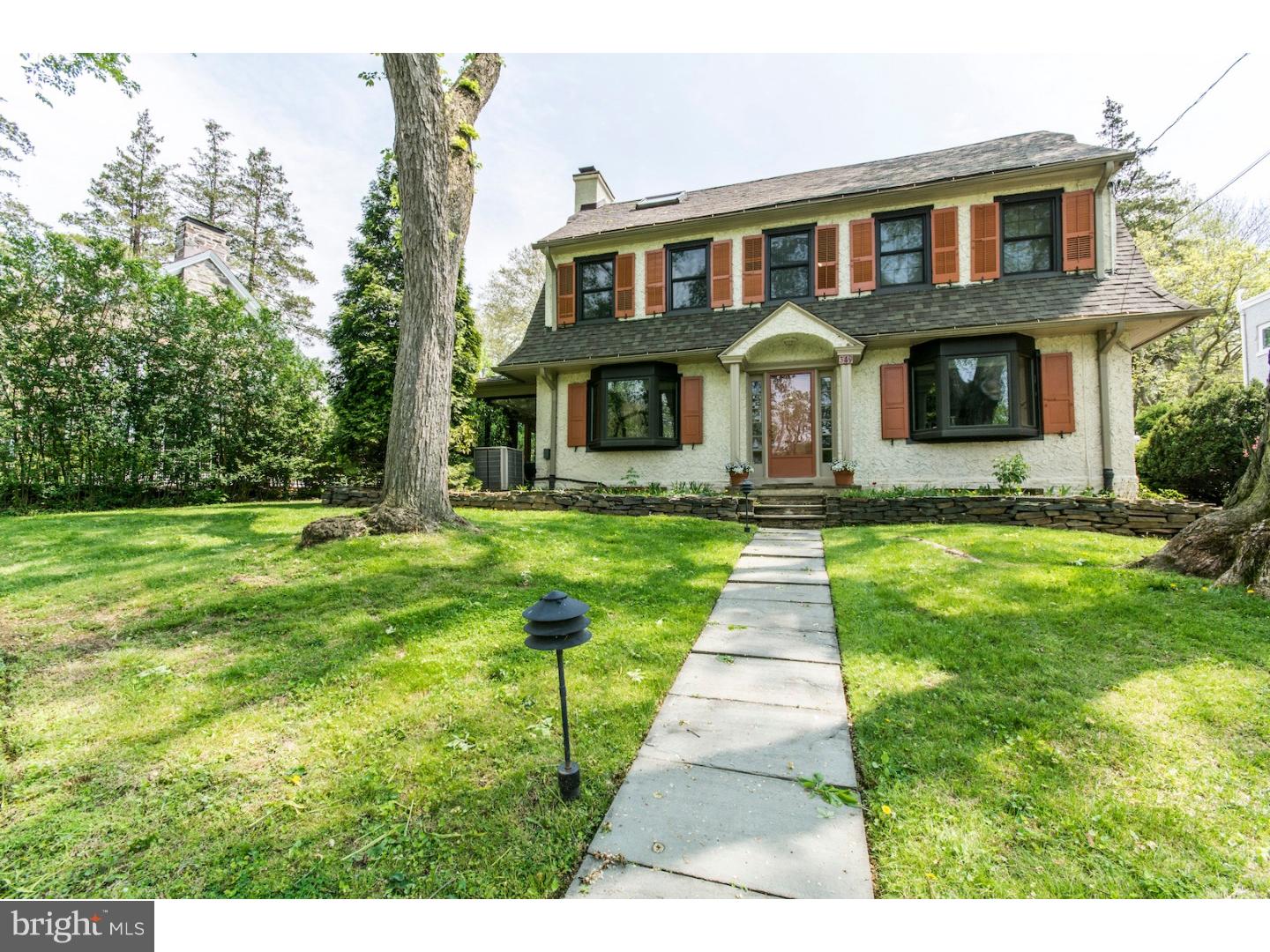 This classic 5 bedroom, 3.5 bathroom stone colonial is located in Bala Cynwyd's most desirable section. Beautiful central entrance opens up to the spacious living room with a cozy fireplace and French doors leading to a heated sunroom/den. The first floor also includes a formal dining room with built in cabinets surrounding the large bay window. There is a newly renovated eat-in kitchen with updated appliances that make it bright and inviting. Next to the kitchen is an updated powder room tucked away underneath the stairs. Off the kitchen is a large deck that looks out onto the expansive level backyard. The second floor includes a master bedroom with ensuite bathroom and walk in dressing room. There are 2 additional bedrooms and a full bathroom completing this floor. The 3rd floor includes 2 additional guest rooms and a full bathroom. The unfinished basement is great for storage and includes the laundry facility. This house also offers newer windows, hardwood floors, a newer roof, central air, and a 2 car detached garage.