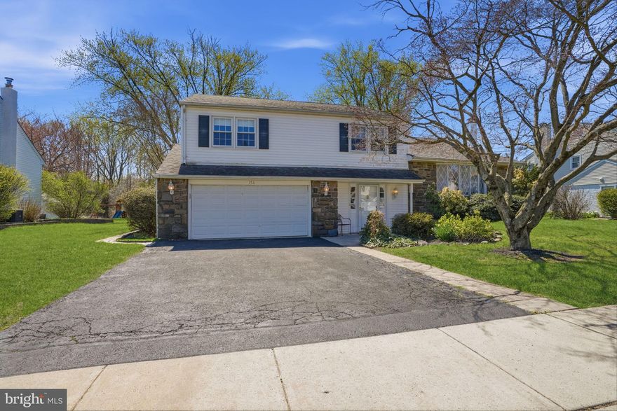 Welcome to 156 Rice Drive in the desirable Hedgerow Woods neighborhood in the acclaimed Pennsbury School District-a spacious four bedroom, two-and-a-half bath, split level home offers comfort and versatility. The inviting layout has been thoughtfully designed, providing distinct living spaces ideal for everyday living and entertaining.  The main level offers a bright and welcoming living area that flows seamlessly into the dining room and kitchen, creating a functional and connected feel throughout.  A half bath is also conveniently located on the main level. Step down off the kitchen to an inviting family room with a cozy gas fireplace.  The fireplace is in-fact masonry and was converted with replacement gas logs.  Can easily be converted back to wood burning.   Upstairs you will find four generously sized bedrooms, including a primary suite with a full bathroom, along with a full hall bathroom.  There are hardwood floors underneath all of the carpets with exception to the family room. Although the cooktop is electric, there is a natural gas hook up behind the stove making it readily available to convert to gas cooking.  In addition, there is a natural gas line on the rear corner of the home for a gas grill hook up, pizza oven, fire pit, etc.  One of the homes stand out features is a covered rear patio, offering the perfect spot to relax and enjoy the private backyard views.  Whether you are hosting  guests or enjoying a quiet morning, this space adds warmth and flexibility to the home.   Additional features include a partial unfinished basement, two car attached garage, ample storage and a sizable private lot, providing plenty of space for outdoor entertaining, gardening or play.  Conveniently located near major highways, shopping and dining. Don't miss the opportunity to make this home your own!  Schedule your private tour today!