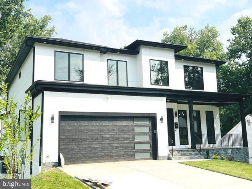 Under Construction. Fully Fenced Backyard! Elevator! Similar house photos attached. Welcome to the epitome of luxury living in Falls Church. This stunning custom home spans an impressive 7500 sq. ft., offering a grandeur that is simply unparalleled. From the moment you arrive, you'll be captivated by the exceptional quality and attention to detail that defines this residence. As you explore the main level, you'll discover a showcase of sophistication. With high ceilings, 8-foot interior doors, a separate office room, and a spacious bedroom with an attached full bath, this level offers both convenience and style. The main kitchen is a culinary masterpiece, featuring meticulously crafted stacked cabinets and a suite of high-end professional appliances. This includes a grand 48-inch counter-depth refrigerator, a high-performance 6-burner range top, a sleek hood, a convenient wall oven, and not one but two dishwashers for effortless cleanup. The mudroom is designed for both practicality and luxury, with thoughtfully built-in cubbies and a bench. UPPER-LEVEL Master bedroom with private balcony, tray ceiling, and big size separate His & her walk-in closet master bath. All the bedrooms are with attached full baths and walk-in closets. The lower level is an entertainer's dream, featuring a well-appointed wet bar, a cozy fireplace, and a state-of-the-art theater for cinematic experiences at home. Stay active and healthy in the gym and enjoy a spacious rec room perfect for gatherings and relaxation. Additionally, there's a bedroom with a full bath for guests' comfort, along with an additional common bath for convenience. Beyond the walls of this magnificent residence lies with its proximity to Tysons Corner, Washington, D. C., two major airports, and major transportation routes, you're effortlessly connected. Enjoy the convenience of nearby shops and restaurants, making every day a delightful experience. This is more than just a house; it's a testament to pride in workmanship and an embodiment of luxury living. Your dream home awaits!