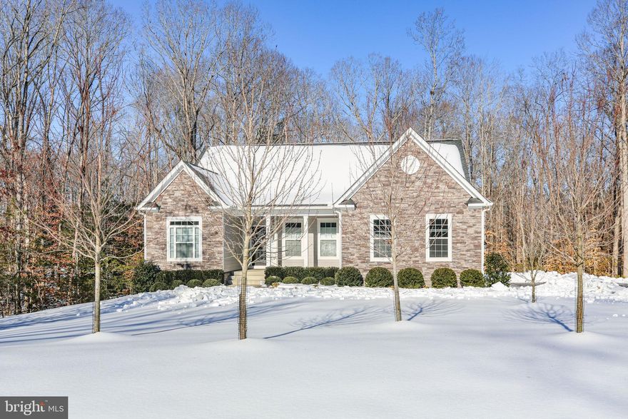 Welcome to the Retreat on Ashford, a home designed for buyers who value peace, space, and intention.

Set on a quiet, low-traffic street with natural distance between neighboring homes and mature trees providing privacy, this property offers a true sense of refuge without feeling remote. Traffic noise disappears, the pace slows, and the setting feels deliberately removed, yet shopping, dining, and daily conveniences are just a ten-minute drive away.

Built in 2022, the home delivers the appeal of new construction without the wait, uncertainty, or expense of building today. Thoughtful upgrades reflect a focus on livability, including custom built-in closet organizers in the primary suite, a full central vacuum system, whole-house water treatment, and an irrigation system supporting the landscaped grounds.

The primary amenities here are quiet, privacy, and room to breathe, both indoors and out.

This is a perfect property for those who want separation from the hustle and bustle found around typical developments, while still remaining comfortably connected to everything that matters.