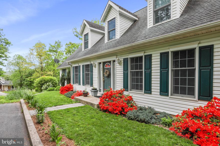 Meticulous Cape Cod located on Rockwell Court in historic Berkeley Springs. Main level features Living Room with Dining area,  guest half bath, spacious Kitchen with breakfast room, owners suite  with walk in closet, laundry room,  large office/craft room could be converted to a 4th Bedroom and  gleaming wood floors.  Upper level has 2 bedrooms, each with dormer windows and full bath.  Basement level has a family room and  tons of storage.   Hot Tub privately located outside the basement entrance.   Easy stroll to shops and restaurants, yet tucked away off a quiet street.  Relaxing on the screened deck will be your favorite spot to enjoy a good book or glass of wine.  Paved driveway, raised garden beds, 2 car attached garage as well as a 3rd garage space under the house. and minimal mowing required.  Perfect for one level living with guest area on upper level or weekend retreat to possibly Air BnB with an easy access to downtown Berkeley Springs