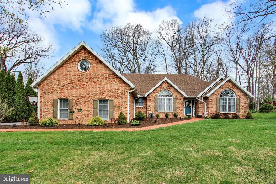 THIS HOME HAS GREAT FEATURES! HARWOOD FLOORS, VOLUME CEILINGS, CUSTOM KITCHEN CABINETS , 5 YEAR OLD ROOF, NICE FOYER ENTRANCE FIRST FLOOR LAUNDRY & POWDER ROOM  AND ALL BRICK EXTERIOR. SPLIT LIVING PLAN. KITCHEN IS EQUIPPED WITH SAM ARMSTRONG CABINETS. NICE PANTRY AND A POWER ROOM & LAUNDRY OFF KITCHEN.  OWNERS BEDROOM IS SPACIOUS  WITH VOLUME CEILING, WALK IN CLOSET, BATH WITH DOUBLE BOWL VANITY, SHOWER AND 2 LINEN CLOSETS. LOWER LEVEL IS PARTIALLY FINISHED, MAKE A GREAT REC AREA AND WORK OUT AREA. SUN PORCH, 2 CAR GARAGE WITH PULL DOWN STEPS FOR ADDITIONAL STORAGE. MATUTE YARD WITH TREES.