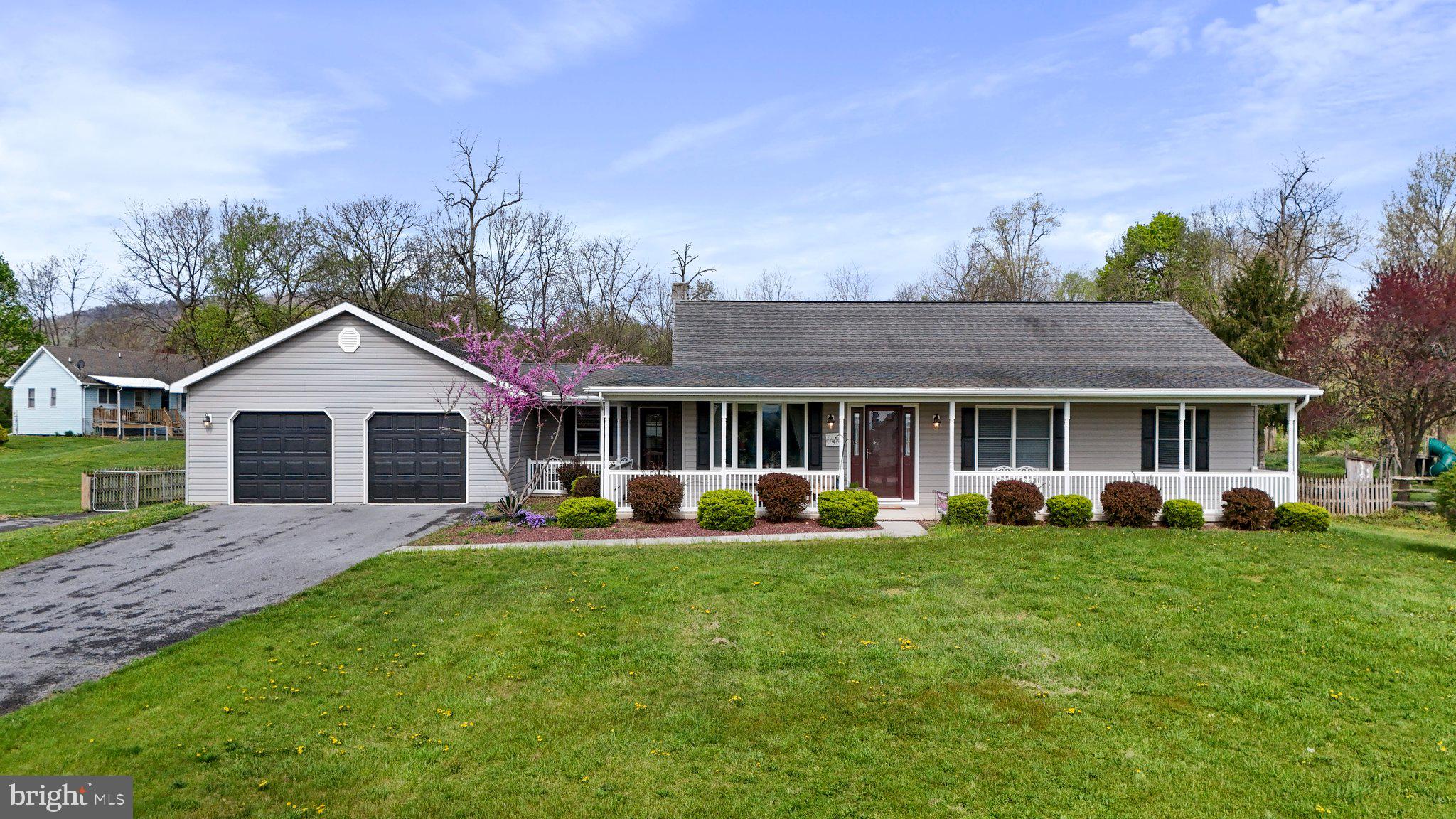 Welcome Home! Beautifully maintained rancher in a great country setting! Featuring 3 bedrooms, 3.5 baths, and situated on just over an acre of land. Luxury Vinyl Plank flooring and crown molding throughout. Separate dining room with a gas fireplace. Spacious living room. Large eat-in kitchen with ample cabinetry & table space, additional dining area, tile flooring, Corian countertops. Pantry space and laundry. Primary bedroom and en suite with a nice soaking tub, walk-in shower, double sinks, and granite countertops. Fully finished basement with a family room, projector and screen, dry bar area, full bathroom, and additional rooms that could be used as bedrooms. Sump pump and backup sump pump. Equipped with a central vacuum. Plenty of parking with the 2-car attached garage and 3-car detached 54x30 pole garage. Includes a car lift, work bench, built-in shelving, insulated and heated. Additional driveway space for a travel trailer or motorhome. Enjoy your days on the wraparound porch or backyard patio. Fully fenced backyard with playground. New A/C (2022). No HOA. Clear Spring school district. This home has so much to offer! Schedule your showing today!