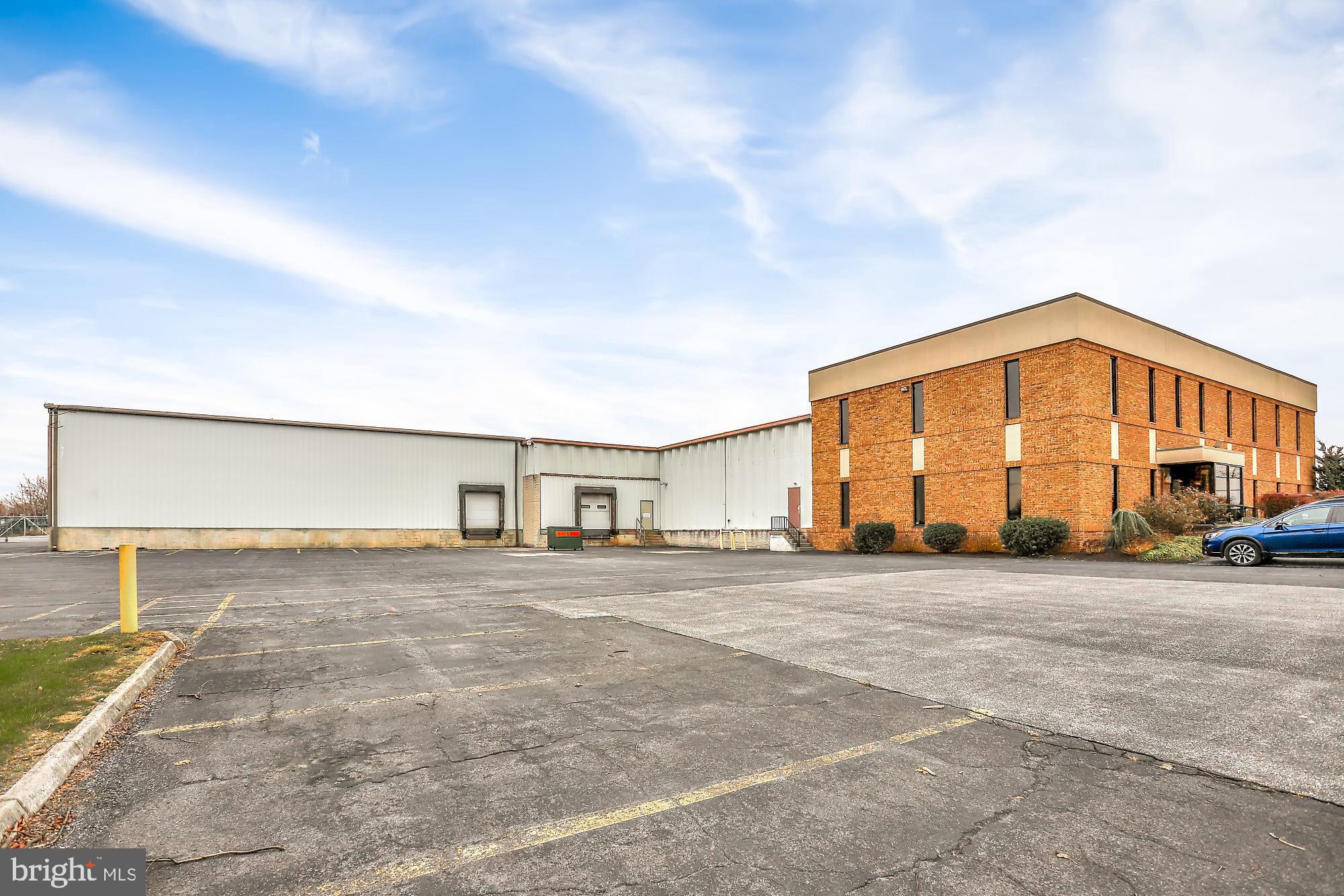 2 story commercial building with 32,000+/- sq ft on 1.77 acres zoned Medium Manufacturing. 5900 +/- sq ft of refrigerated warehouse space, secured/fenced-in lot, 6 spaces for trailer parking, 30 spaces for car parking, 2 dock doors and 1 drive-in door. Only 2 miles to Interstate 81. Covered outside storage, dry warehouse space, and office space.
