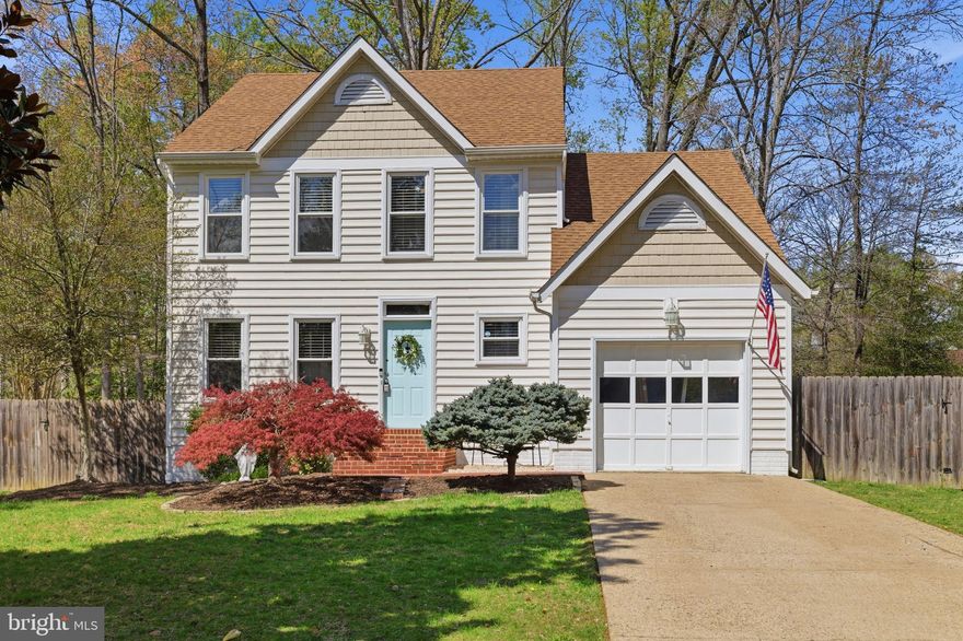 Charming 4-bedroom, 2.5-bath colonial offering a perfect blend of comfort, style, and convenience! This well-maintained home features a beautifully remodeled kitchen with updated countertops, backsplash, sink, faucet, garbage disposal, and a top-of-the-line Bosch dishwasher, along with a Maytag front-loading washer and dryer. Enjoy a spacious family room with vaulted ceilings, fireplace, recessed lighting, and added lights and ceiling fans throughout. Custom blinds enhance the home’s appeal, while some new hardwood floors and a renovated laundry room add to the list of thoughtful updates. Major improvements completed in 2020 include a new roof, siding, and gutters, along with 8 replaced windows and a new sliding glass door. Step outside to a fully fenced, park-like backyard with mature trees, a deck, and a brick patio—perfect for relaxing or entertaining. Water drop reverse osmosis filtration system Ideally located with no HOA and convenient access to I-95, shopping, and Quantico MCB. Home shows beautifully! Seller prefers a quick settlement with post-occupancy through mid-June.