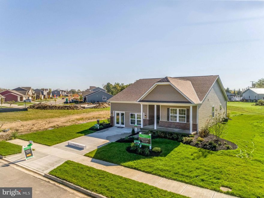 To be built SANIBEL, 1,704 square feet, 3 Bedroom, 2 Bath, ONE LEVEL LIVING, RANCH style home that can be built on a slab or optional basement!   Your guests will be greeted in a spacious Foyer/ Hallway with large coat closet  leading to the Great Room consisting of a light filled, large Family Room, Kitchen and Breakfast Nook.  The gourmet Kitchen features 36" Shaker style base and wall cabinetry, granite countertops, recessed lighting, corner pantry with a full array of stainless steel appliances- dishwasher, disposal, double bowl sink, built in microwave, range and refrigerator with icemaker. The Owner's Suite features a large Owner's Bedroom with walk in closet and Owner's Bath with vanity with dual sinks, spacious shower with ceramic tile surround and ceramic floors.  The second and third Bedrooms are separated from the Owner's Suite for privacy.  Both secondary Bedrooms are served by the second Bath with tub shower with ceramic tile surround and ceramic floors.  The linen closet and washer/ dryer closet is conveniently located nearby.  Access to the two car garage is located from the hall and includes a garage door opener.   ONE LEVEL LIVING - perfect for both family living and entertaining!  Spacious 9' ceilings are included throughout the main level!
CUSTOMIZE your new  SANIBEL home with many designer upgrades not found in other homes!  Dual shower heads with third 'rainforest' shower head in Owner's Bath ceiling, additional light filled window designs, additional choices of Kitchen cabinetry, countertops and appliances, Family Room fireplace, basement with finished areas,  front porches with stone fronts and much more!   All with NEW HOME WARRANTIES!  Ask about Preview Sales Specials!
The SANIBEL is being offered at the beautiful established community of Maronda at Stoney Ridge in Inwood, WV.   10,000 s.f. + homesites backing to trees and with views. New homesites just opened up for sale.  Preview Sales Opportunity- Purchase now for additional closing costs and included features!  Call for more information and an appointment today!