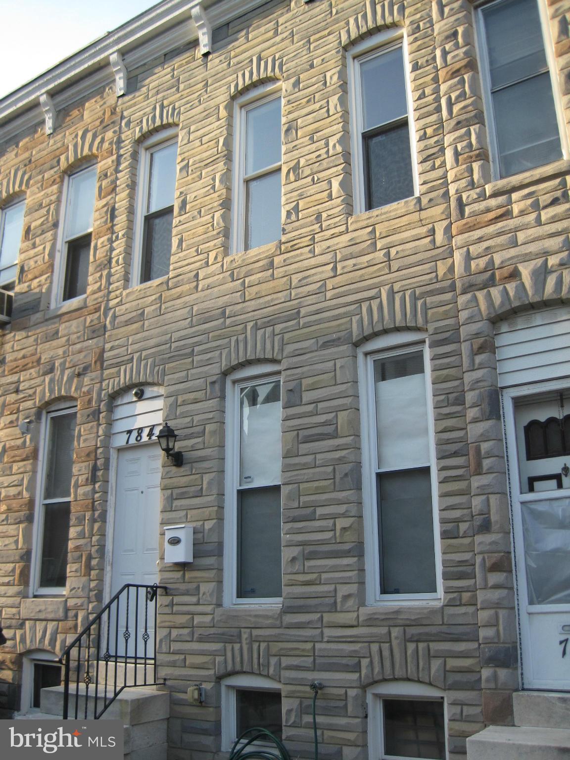 Great 2 bedroom, 2 bath rental in Federal Hill. Open concept first floor. Renovated kitchen with SS appliances, center island, hardwood floors. Large fenced courtyard. Permitted parking. Unfinished basement for storage. Back master bedroom with master bath attached. 2nd front facing bedroom with larger closet. Wired for alarm system. Convenient to stadiums and all Federal Hill has to offer!