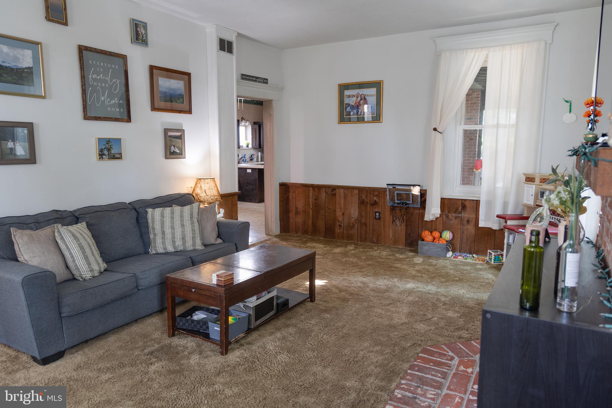 Step into a piece of history with this beautifully maintained 1900-built Colonial, where timeless charm meets modern convenience. Ideally located just off Highway 30—right between Lancaster and York—this spacious 4-bedroom, 2-bath home (plus a bonus room) offers both character and convenience for commuters and families alike. You'll be welcomed by tall ceilings, elegant crown molding, and original architectural details that reflect the home’s historic charm. Enjoy multiple outdoor spaces, including a classic front porch for evening relaxation, a screened-in side porch perfect for morning coffee or entertaining, and a deck ready for summer grilling. Inside, the generous eat-in kitchen provides a cozy hub for everyday living, while the first-floor laundry—conveniently located just off the kitchen—adds practical ease. (The laundry room could be a primary suite for 1st floor living, also what is now a game room could be a formal dining room. Listing agent related to seller.