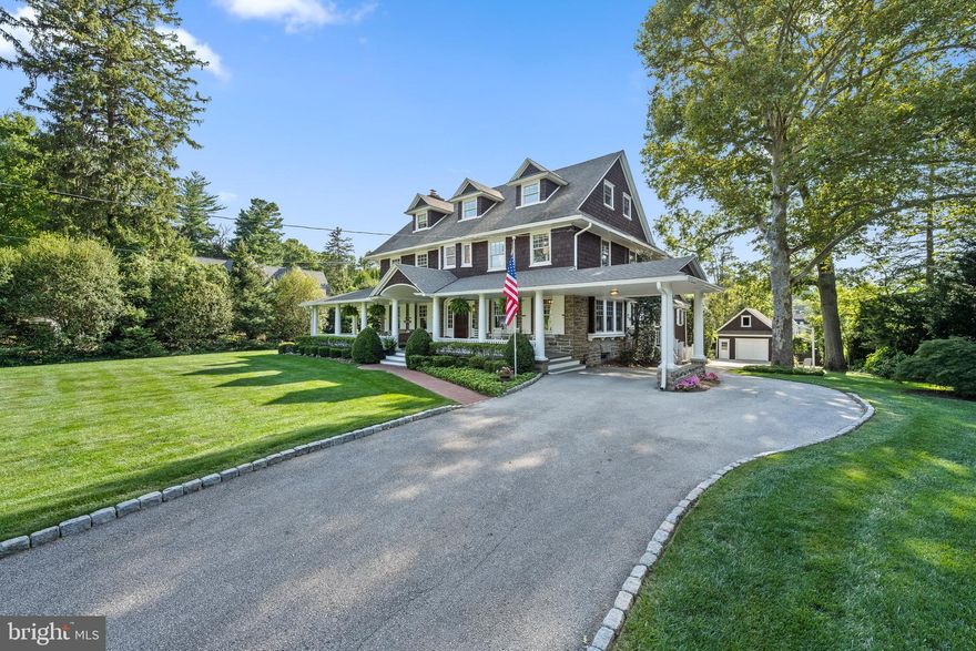 Welcome Home  to 334 Louella Avenue, located on the most picturesque tree lined street in coveted South Wayne. Originally built in 1900 and affectionally known as "Bankers Row", this magnificent gem has been the pride and joy of the neighborhood for over 120 years!!  Whether walking or driving by, ones heart is immediately captured and the warmth of the property can be felt by the one-of-a-kind inviting front Porch that sets the tone for this grand dame. Rich in history, the exquisite mahogany front door opens to  the grand Foyer where gleaming hardwood floors seamlessly carry you throughout the First Floor creating an harmonious blend of the formal and informal spaces. Old world elegance abounds in the gracious Living Room with deep windowsills, balanced by a grand stone fireplace and  exceptionally detailed coffering ceiling marrying the many conversation areas.  
The large traditional Dining Room with window seat calls for many "sit down dinners" and is entertainers  dream  with an adjacent walk-in Butler’s Pantry and  wet bar. In 2000  the home was restored, repurposed, and an addition flawlessly connected to the original part of the home creating the masterpiece that it is today and rarely found in a house of this age. Flooded with natural light from the window-filled addition a perfect harmony of function and design was created consisting of a Great Room, Breakfast Area and gourmet Kitchen that all capture the backyard oasis. A true chefs delight, the Kitchen has a large island with granite countertops, Country Craft cabinetry, walk-in pantry  and commercial grade appliances.  For added convenience, a large Mudroom with built-in cubbies is easily accessible from the Kitchen, back door, backstairs and the First Floor is completed by a lovely Powder Room.

The sweeping staircase brings you to the Second Floor with glorious high ceilings, where an eloquent  Primary Suite awaits.  A spacious dressing room with walk-in closets leads to a newly renovated marble Primary Bath featuring a soaking tub, glass-enclosed shower, double sink vanity, radiant floor heating and original stain glass windows. This suite is completed by a Sitting Room where it would be a dream to begin and end your day with an outside balcony capturing the backyard sanctuary.  The Second Floor has an 2 additional generously sized Bedrooms, updated Hall Bath and Laundry Room.  High ceilings continue throughout the Third Floor, where  3 additional Bedrooms can  be found and  serviced by an updated Full Bath. The family friendly square footage continues down to the  finished Lower Level with Full Bath, and plentiful storage. And the magic continues to the outside "Hampton Like" paradise where lush green landscaping  provides a private oasis featuring a sparkling Pool, flagstone Patios,  and a carpet of green grass. A one car detached Garage completes the outside. 
This exceptional property has provided 27 years of cherished memories to its current owners and  is ready  to begin its next chapter.... don't miss this once in a lifetime opportunity....showings begin Tuesday August 29th!!