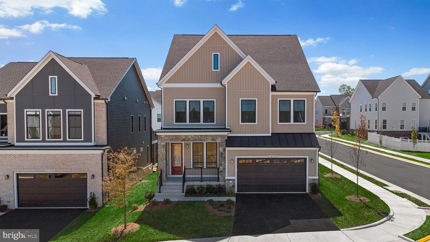 Don’t miss your chance to own an incredible brand new SINGLE FAMILY HOME by Van Metre Homes at WEST PARK IV ready for you in IMMEDIATELY.  With 4,595 finished square feet, 6 bedrooms, 5 full and 1 half bathrooms across four levels, this residence combines elegance with functionality. Step inside to discover 9' ceilings and opulent luxury vinyl plank flooring adorning the expansive main level, where an open layout seamlessly connects the sunlit great room with a gas fireplace, elegant dining area, walkout screened back porch, and secluded study. The heart of the home lies in the elegant kitchen—a culinary haven boasting upgraded cabinets, quartz countertops, and quality stainless-steel appliances, ideal for both cooking and entertaining. Ascend to the next level to indulge in the lavish primary suite where luxury vinyl plank flooring continues, complete with a spa-like bathroom showcasing double sinks and an oversized shower enclosure with a built-in seat. Three additional bedrooms, two full baths, a flex retreat area, and a convenient laundry room with utility sink complete the floor. On the upper level, a versatile loft and additional bedroom with full bathroom awaits, offering a connected, yet private retreat. Unwind in walkup finished basement with a multipurpose rec room or rest in the bedroom and full bathroom for added comfort. Enjoy the 2-car front garage that is easily accessible from the family foyer and allows for a sizable backyard that is accessible directly from your walk-out basement and is perfect for outdoor gatherings. Being a new build, your home is constructed to the highest energy efficiency standards, comes with a post-settlement warranty, and has never been lived in before! The SAMSON 36-F2 floorplan is more than just a home; it's a testament to contemporary luxury living at its absolute finest. Don't miss your chance to experience the pinnacle of elegance and sophistication—schedule an appointment today! ----- Find the home for your next chapter at West Park IV, a brand new neighborhood offering the final available single family homes in the award-winning community of Brambleton, VA. Embrace an exceptional lifestyle in Brambleton, a highly sought-after community that seamlessly combines contemporary living with suburban allure. This family-friendly community offers a wide range of amenities at your fingertips, including miles of trails, tot lots, parks, pools, and highly sought-after schools within walking distance. Plus, with the bustling Brambleton Town Center two miles from your doorstep, you can access limitless shopping, dining, and entertainment opportunities. Experience the perfect balance of comfort, convenience, and connectivity at West Park IV. ----- Take advantage of closing cost assistance by choosing Intercoastal Mortgage and Walker Title. ----- Other homes sites and delivery dates may be available. ----- Pricing, incentives, and homesite availability are subject to change. Photos are used for illustrative purposes only. The community lies within the Airport Impact Overlay District (within the 1 Mile Buffer). Due to its proximity to Dulles International Airport, this site is subject to aircraft overflights and aircraft noise. For details, please consult the Sales team.