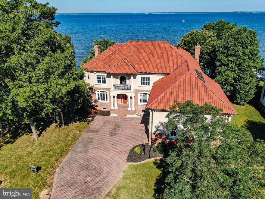 A rare opportunity to enjoy a peaceful but active upscale neighborhood that never lost its sense of community.  From your pier crabbing, fishing, boating plus neighborhood world class golf course,  country club, yacht club, marina and beautiful community maintained common grounds, beach and park .  So near Washington DC and northern VA.  Work from home with wifi available and plenty of office space.  Public water and sewer, wifi and cable give you all the conveniences.  Yacht club and many activities and amenities in top quality community.  Safe  secluded neighborhood  for healthy living environment with country stores, wine bar cafe nearby, walking paths,  ponds, beautiful views every place you look.  Your family and guests will never get bored  here.  An uncrowded waterfront community pool available when you need it but you don't need to maintain it.   All of this seclusion and safety but  so near to DC and northern VA.   Amazing waterfront views from both master bedrooms, great room, living room, kitchen and all eating areas.  Step out onto a covered porch and balcony overlooking Potomac River and large pier with heavy capacity boat lift.  Spacious 3-4 car garage has high doors to accommodate boat, jet skis, canoes, water toys/tubes.     Kitchen is every chef's dream.  High end stainless appliances include 3 ovens,  2 dishwashers, huge commercial size refrigerator, separate commercial upright freezer, wine refrigerator, 3 sinks, separate  built-in large capacity icemaker (you will never need to run to store for ice) ,warming drawer, separate refrigerator in mud room off kitchen.  You won't beat this price per sq. foot for huge, amazing quality waterfront . Extremely high  quality construction and features, 6520 sq. ft .   Your family and guests will have plenty of space for comfort in this luxurious home.   Two master suites,  6 bedrooms, 5 luxury baths, one half bath, 3 fireplaces.  Media/game room with outside garage stairs and storage areas.  Home is built to stay with storm protection in windows, doors, and sturdy construction. Mud room and 2nd stairs designed to convert to elevator shaft if needed in future. Cement basement/crawl space has high ceilings , concrete floors , inside entrance from main level great room, side entrance to outside.  Terra cotta tile roof has 50-75 year guarantee.  Copper oversize gutters.  Hurricane resistant Anderson windows and doors.   Heavy capacity boat lift. Shoreline reinforcement and entire shoreline rip-rap.  Appraisal is available for review.  Swan Point has an HOA fee which is $225 semi-annually, plus a homeowner's membership to the Country Club. The basic membership is $140.00 a month and there is a Food and Beverage  requirement of $150 per quarter that is used at The Club, as required in most yacht, golf and country clubs.  Pro shop , driving range, putting green,  pool on river, marina, beaches, gourmet restaurant and bar in the neighborhood .  Two miles to wine bar, cafe with upscale dining, coffee shop.  Minutes by boat to numerous tiki bars and restaurants by water.  Luxury lifestyle.