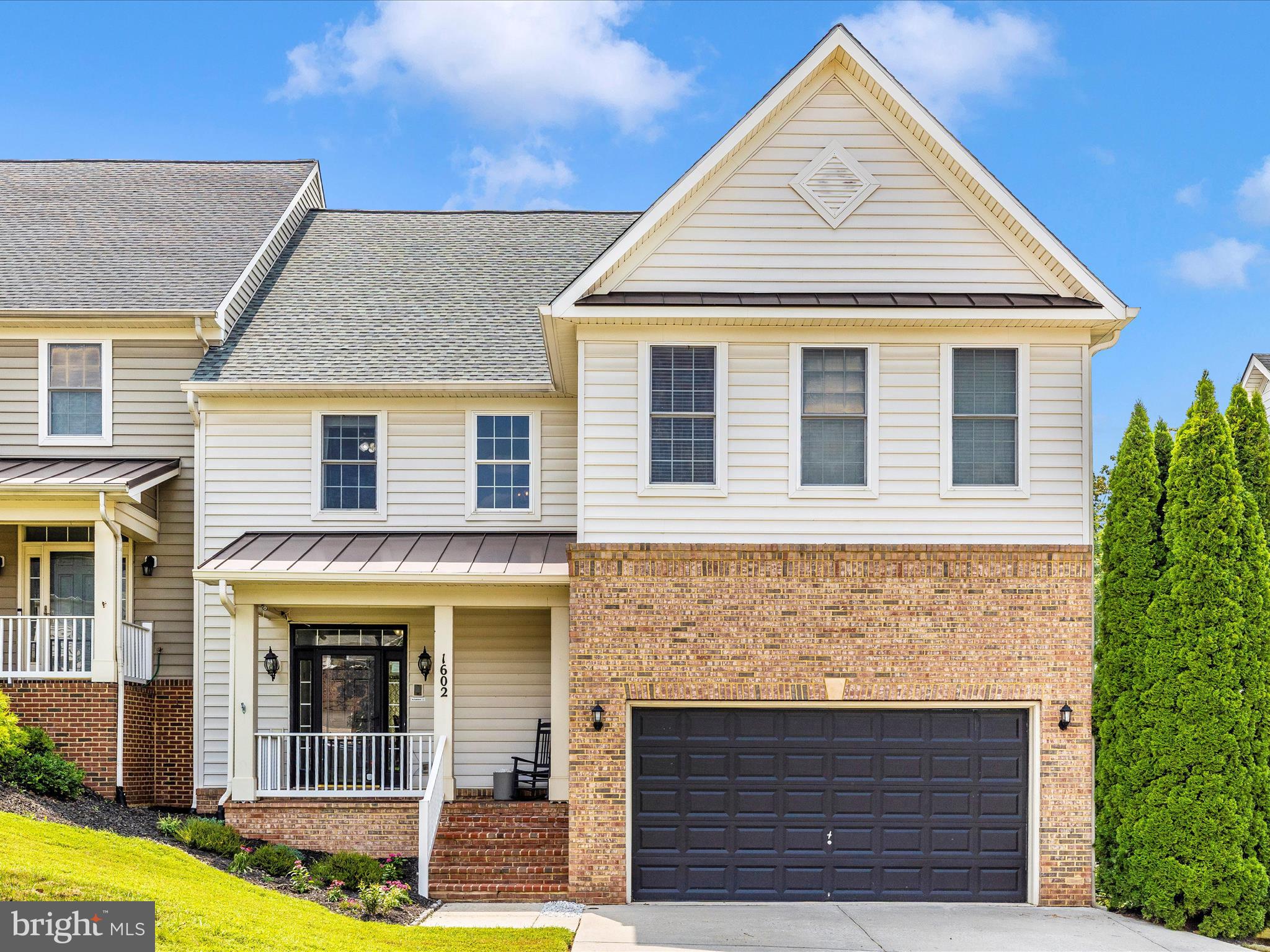 Spectacular 5 bedroom/4.5 bath semi-detached home located in Mount Airy's sought after Ridgeville Heights community. Just shy of 4200 square feet on 3 beautifully finished levels. The main floor is an entertainer's dream with a sun-filled, multi-level open concept floorplan featuring wood floors, formal living room, formal dining space, family room with gas fireplace, kitchen/breakfast nook with stainless appliances + upgraded quart countertops + a sunken sunroom. The upper level boasts a gorgeous primary suite with cathedral ceilings, large adjoining seating area, 2 custom walk-in closets + an updated luxury bath with free standing tub, huge designer walk-in rain head shower system + double sink vanity. A separate laundry room, 3 additional bedrooms + 2 full bathrooms complete the upper level. The fully finished, walk-out lower level has been transformed into a space where everyone will want to hang out. A massive rec room with movie seating/screen, beautiful bar area, full bath, an exercise room + a 5th bedroom. Let's not forget the incredible fenced back yard with deck and paver patio. Welcome to your new home!