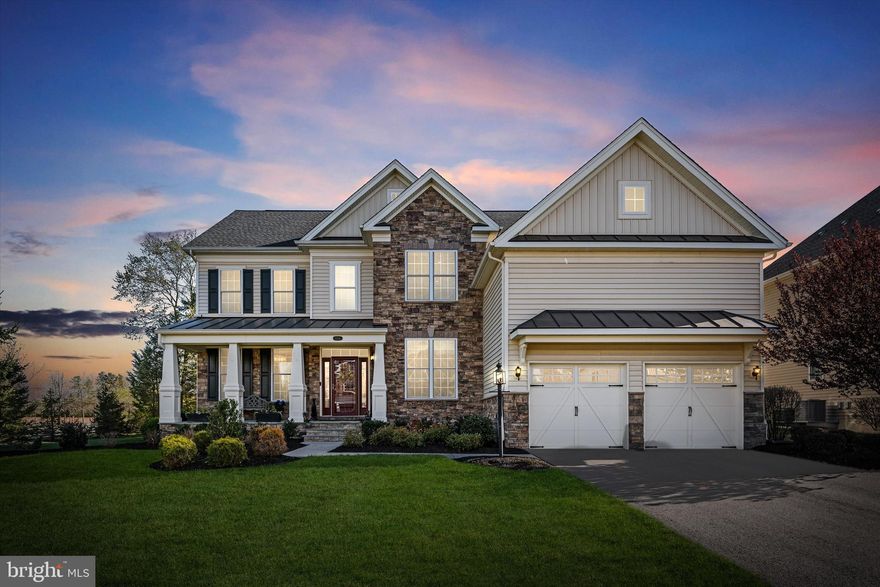 OPEN HOUSE CANCELLED. UNDER CONTRACT!
This spectacular 4-bedroom, 4.5-bath home in the sought-after Dominion Valley Country Club community shows like a model! Built just seven years ago and immaculately maintained, it feels like walking into brand-new construction. Thoughtfully designed with high-end finishes throughout, the home welcomes you with a dramatic two-story foyer featuring an elegant chandelier on an Aladdin lift for easy maintenance. Gorgeous wood floors flow through the main level, complemented by high ceilings with crown molding, and chair rail accents in the foyer, formal living, and dining rooms. Enjoy the privacy of the main level study/home office with double doors. The light-filled kitchen is a chef’s dream, with upgraded cabinetry, granite countertops, a large island with bar seating, stylish tile backsplash, a 5-burner gas cooktop, and stainless-steel appliances. The open layout from the kitchen to the family room makes everyday living and entertaining a breeze.
The owners have made stunning enhancements, including a Trex deck with an enclosed gazebo, a beautiful stone patio, and a full irrigation system in both the front and rear yards. They’ve added stylish updated lighting throughout the home, a Generac whole-house generator for peace of mind, and custom closets—especially the dream-worthy walk-in closet in the primary suite that’s as functional as it is beautiful. In addition to the grand primary suite with a sitting area, the upper level boasts 3 spacious bedrooms and 2 full baths. The finished basement offers versatile living space with a wet bar, beverage fridge, and microwave, with plenty of space for entertaining and relaxing. A finished full bath allows for the potential of adding a den/fifth "bedroom". A generously sized storage room adds to the home’s sense of well-organized functionality.
Situated on a desirable corner lot, the property offers extra privacy with mature trees lining the rear and side yards. This home is truly move-in ready!
Nestled within the prestigious Dominion Valley Country Club, residents enjoy an exceptional lifestyle with an array of resort-style amenities. The community features two 18-hole Arnold Palmer Signature golf courses, a grand 30,000-square-foot clubhouse offering multiple dining venues, elegant event spaces, and a well-appointed pro shop. Stay active at the Sports Pavilion, complete with a state-of-the-art fitness center, four outdoor pools including a 25-meter competition pool, and an indoor pool for year-round enjoyment. Newly renovated pickleball and tennis courts, scenic walking trails, two stocked fishing ponds, and numerous tot lots provide endless opportunities for recreation and relaxation.
Residents benefit from the convenience of having four schools located within the community. Dominion Valley offers an ideal location with nearby shopping, dining, easy access to I-66, and just 30 minutes from Washington, D.C.—making it a perfect blend of comfort, connectivity, and an amenity-rich lifestyle.