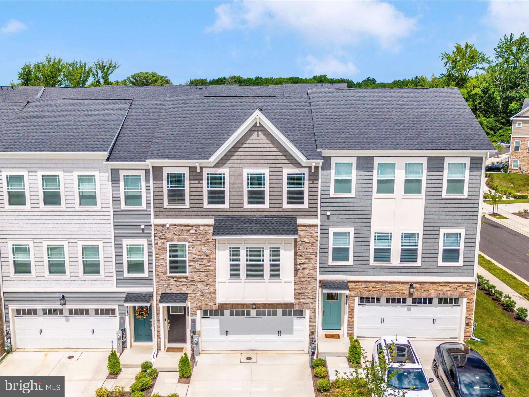 ***More Photos Coming Soon*** Welcome to the Fresh and Brand New 1806 Watermark Way, a stunning 3-bedroom, 2.5-bath townhome in the sought-after Water’s Landing community in Essex, Maryland. Built in 2024, this like-new home offers over 1,950 sq. ft. of modern, open-concept living across three beautifully finished levels. The main level features luxury vinyl plank flooring, an expansive living area, and an upgraded kitchen with beautiful granite countertops, an island with breakfast bar seating, and stainless steel appliances. A convenient half bath and a large rear deck make entertaining easy. Upstairs, the spacious primary suite includes a walk-in closet and a luxurious ensuite bath with a granite-top double vanity and a large walk-in shower, while two additional bedrooms and a full bath provide plenty of space for family or guests. The finished lower level offers a walkout basement with a versatile rec room — ideal as a home office, gym, or optional fourth bedroom — plus interior access to the 2-car garage and a large concrete driveway for extra parking. Water’s Landing is a vibrant waterfront community featuring two private community piers on Middle River for kayaking, paddleboarding, or simply enjoying the view, as well as walking paths, a gazebo, and sidewalks throughout. Residents are close to local marinas, waterfront dining, boat clubs, and Gunpowder Falls State Park for hiking, biking, and water recreation. Located just minutes from I-695, I-95, and the MARC train station, this home offers an easy commute to downtown Baltimore and nearby beaches and parks. Don’t miss this rare opportunity to own a move-in-ready, 2024-built townhome with a walkout basement in one of Essex’s premier waterfront communities.