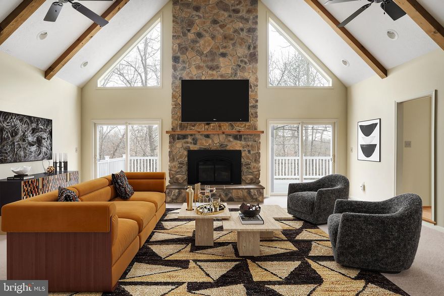 This Chalet home offers a unique combination of Rustic Charm and Modern Amenities. You will love the natural wood walls, beamed ceilings, and cozy fireplace. The wrap around deck is perfect for entertaining, and the open floor plan allows for easy flow between the living, dining, and kitchen areas. The spacious loft overlooks the main living area, and the two embassy sized bedrooms provide plenty of room for overnight guests. The large primary bedroom has a luxurious en suite bath and walk-in closets. The lower level has a family room/den and full bath, as well as additional unfinished space for storage or future rooms. This home is well maintained with 2x6 framing in exterior walls and load-bearing walls, a 5-ton heat pump, and a standby generator. Enjoy breathtaking sunrises and sunsets from your family-sized wrap around deck. This could be your full-time home or a perfect weekend retreat, could also be an  AirBnB.  
Convenient to Brewery's, Wineries and other Local Venues. Nothing to do except Move-in. Peace and Tranquility abounds! Call Today!