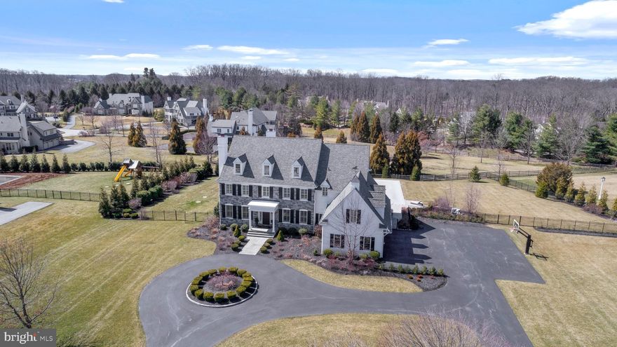 The world is getting ready to entertain again and this property promises to provide endless opportunities both inside and out !! From the moment you pull into the premier neighborhood of White Horse, where luxury and community intersect, this sophisticated  stone colonial graciously welcomes you from a circular drive. Built by Nolan Builders 6 years ago, elegance abounds as luxury finishes can be found throughout putting this beauty in a class of its own.  Upon opening the front door natural light bounces off the gleaming hardwood floors carrying  you throughout the First Floor's circular plan while seamlessly connecting the formal and informal spaces.  The elegant Foyer is flanked by  "perfectly sized"  Living and Dining Rooms which are not just used  for entertaining, but enjoyed on a daily basis. The heart of the home is warmed by a fireplace that can be captured from the open Family and Kitchen rooms flooded with southern exposure from expansive windows and views of the backyard oasis. A chefs dream, the flawless gourmet Kitchen features stainless- steel appliances, large island with quartz countertops, and neutral cabinetry which conveniently flows into an expansive Mudroom with charming brick flooring and cubbies. The first Floor is completed by a private Office, and Informal and Formal Powder Rooms. Tucked away from the rest of the Second Floor a   stunning Master Suite awaits you at the top of stairs  providing a private retreat, with his and hers walk-in closets and luxurious marble Master Bath. Hardwood floors guide you into 2 additional Bedrooms with Jack and Jill Bath, and a 4th en-suite Bedroom with private Bath. The Second Floor is completed by an expansive 5th Bedroom and Bath suite over the 3 car Garage. The square footage of this gem continues up to the Third Floor that is fully finished and provides endless opportunities.  You will never need to go to a gym again as the Lower Level is a workout enthusiasts dream with a state of the art Exercise Room and steam shower full  Bath and Powder Rooms. There is additional finished space perfect for a Theatre/Play/Family Room, and plenty of storage with stairs that lead up to the Mudroom.  The inside amenities are not to be outdone by the property's 1.5 acre backyard paradise featuring a resort style salt water Pool and two tired patio with built in grill, pizza oven, warming oven and granite countertops.  This home has it all and is move-in ready while being conveniently located near all   major highways, shopping centers and restaurants!!! A true treat to see and even better to own!!.   Please note that Delaware County is conducting a real estate tax reassessment, effective January 1, 2021 The tax information reported in the multiple listing service is provided from records which may not have updated and may be incorrect. If you have any questions or concerns about the real estate taxes for this property, you should contact the Delaware County Treasurer's Office or call the Tax Reassessment Hotline at 610-891-5695...