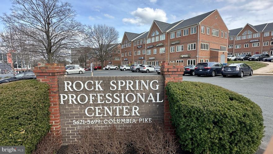Can't beat the price $1,300 a month for Approximately 912 SF Professional Office available for lease.   Located on a highly visible location phasing Columbia Pike's commercial district and sited around the new planned revitalization projects at the  Bailey Crossroad's region of Mason District. Rock Spring Professionals complex offers parking for visitors and patrons.   This is a large open plan workspace, high vaulted ceilings, 1 private office, 1 large half bath.   Top floor.  This corner office has plenty of natural light, with windows around 3 sides.   This space is offered furnished  (desks, chairs convey).   This is a true affordable turn-key/move-in Office Space.  Tenant pays electricity/Internet and alike.   Contact us for a tour. By appointment only LA must be present.