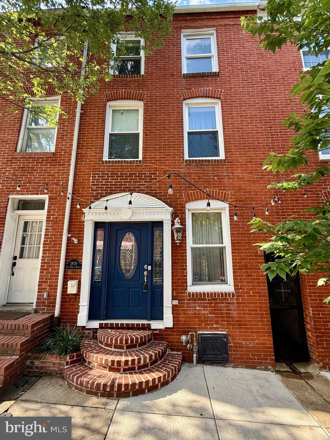 Make this classic, charming 3-story townhome in historic Upper Fells Point your new home! This 3 bed, 2.5 bath home has beautiful hardwood floors and recessed lighting throughout. Walk in to large, open concept living area with exposed brick wall and not one, but two fireplaces!Crown molding gives this multi-use space and elegant touch. Short hallway connects to spacious dining room and kitchen featuring all stainless steel appliances. Vanity half bath for your guests rounds out this first floor. On the second level, there are two guest bedrooms and a full bath with tiled shower and separate, jetted tub. Front loading washer/dryer combo on this level and walk out to second floor balcony with spiral metal staircase to upper level deck. The third level is comprised of the master suite with large walk-in closet and updated full bath also with tiled shower and separate, jetted tub. Enjoy views looking facing Fells Point waterfront and inner harbor from the rear deck, perfect for entertaining. Easy walking distance to Fells Point dining and nightlife, Patterson Park, and Johns Hopkins medical campus. This home can make a great rental for Hopkins med students if looking for investment opportunity. Short distance also to bustling Canton, Harbor East, and Inner Harbor neighborhoods. Come see all this home has to offer!
New roof and French drain in basement