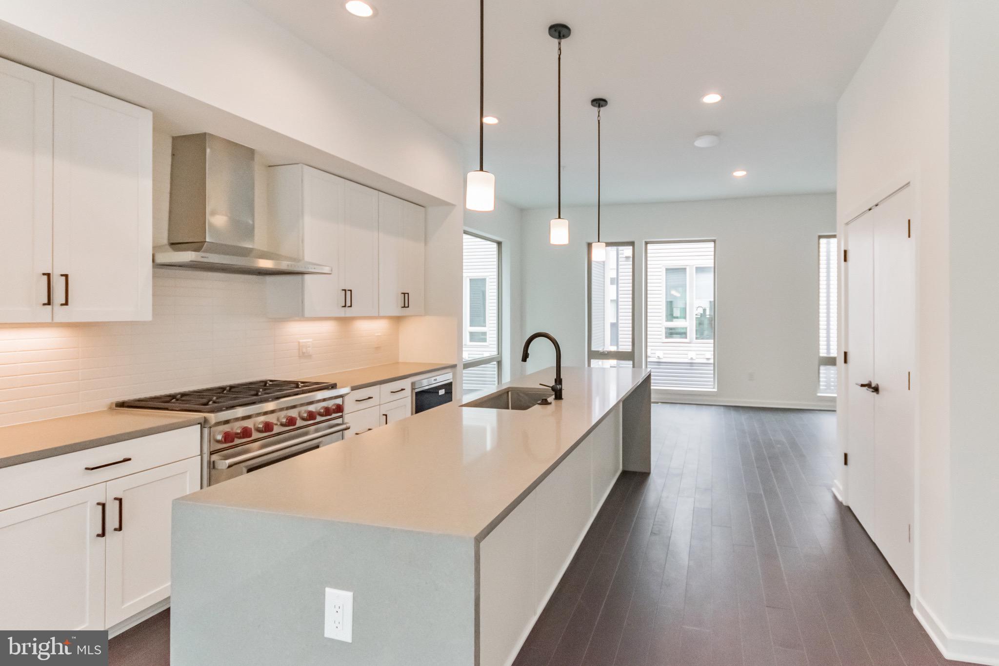 GORGEOUS LUXURY NEW CONSTRUCTION 5 bed, 4.5 Bath Rental with an ELEVATOR, ROOF DECK and TWO CAR PARKING in Fishtown. You do NOT want to miss this listing. The ground floor (street level) features 1 bedroom and bath and the garage. The 2nd floor features an open concept chef's kitchen with WOLF appliances, a dining room, living room and a powder room. The third floor features 3 bedrooms, 2 full baths and laundry. One of the bedrooms on this level has an en-suite bath. The fourth floor is the primary suite with a large bedroom with a walk-in closet, en-suite bath and a BONUS ROOM that could be a nursery, office or another large closet. The 5th floor features a massive roof deck with stunning bridge and center city views and an outdoor kitchen. The river can also be seen from the roof deck. This home is complete with a TANKLESS on-demand hot water heater and DUAL ZONED heating/cooling. 1st month + 2 months of security due at signing. Tenant pays all utilities. Pets on a case by case basis (pet fee or pet deposit might apply).