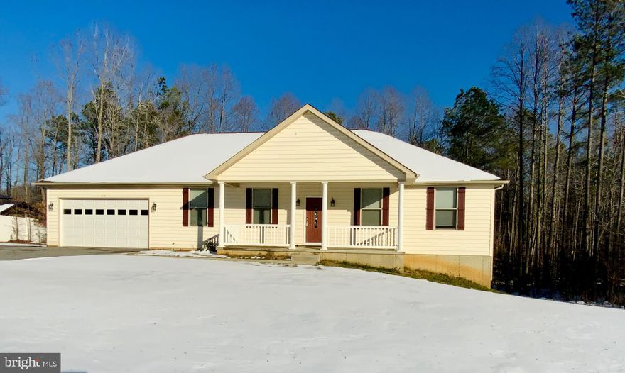 Beautiful Rambler w/ open floor plan, master suite on left side, guest rooms on the right. Master has walk in closets, crown moldings, super bath w/ corner tub, walk in shower w/ dual shower heads/controls, his & her vanities, kitchen features custom cabinetry, stainless appliances (excluding refrigerator), large island, breakfast/dining area, opening to a deck overlooking back yard. Lower level is open & ready for you to finish & make your own. It does feature a full bath, doors walking out to a concrete patio. Freshly painted & all new flooring. Garage is very nice, has sink & Swisstrax flooring tiles. Beautiful neighborhood of custom homes on 1+ acre lots, convenient to 234 or 235/Rt5. 
Internet is Atlantic Broadband.