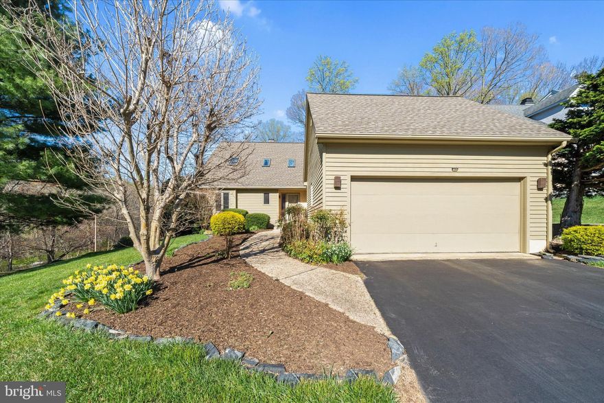 ***Upgrades include newer washer, dryer and refrigerator, roof replaced in 2013, water heater in 2021 and a/c in 2018, furnace 2026, deck and railing replaced in 2019.***A secluded neighborhood of 18 beautiful homes surrounded by wooded spaces and stunning landscaping. A cedar contemporary designed to take advantage of the views and upgraded with a Trex® deck and maintenance free railing. Enter into a two-story foyer with a turned staircase leading to a loft overlooking the great room. Two bedrooms flank the loft and share a spacious main bath. The main floor is well organized from the 6X19 ft. foyer leading to a great room containing living and dining space. The ceiling is vaulted and flooded with light from skylights and two sets of patio doors opening to the expansive deck. A wood burning fireplace is flanked by bookshelves and storage cabinets. Hardwood flooring runs through the great room, primary bedroom and dressing area. The dining area has an entrance to the spacious kitchen for informal gatherings and enough workspace for multiple cooks. A tile floor extends through the kitchen into the adjacent well positioned sunroom with access to a brick paved patio and side yard. Buy now and be settled in time to watch the historic Wilmington and Western Christmas train pass by. Schedule your tour today!