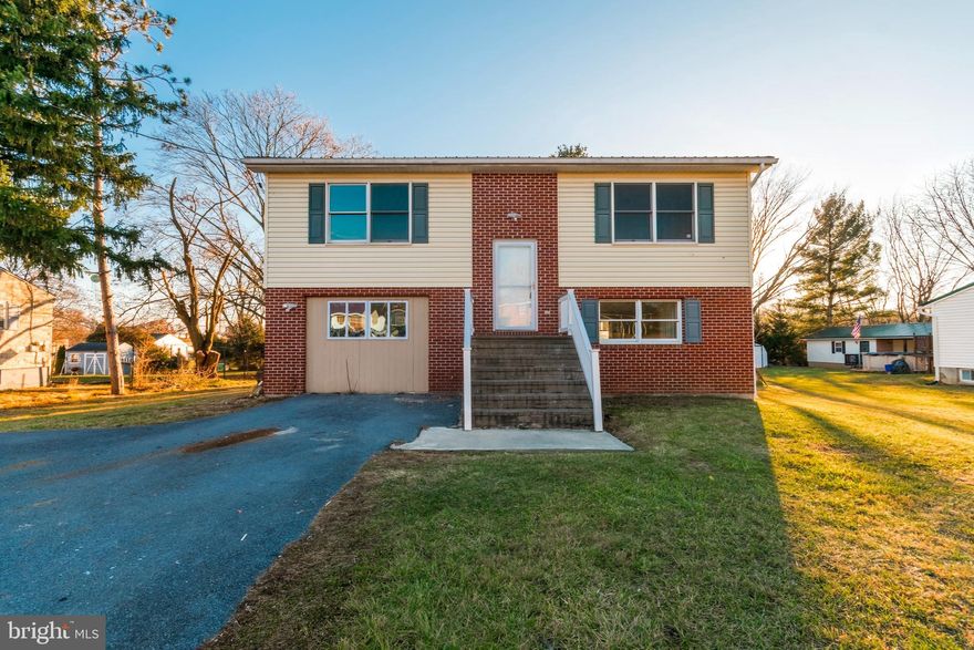 Recently remodeled home features a new kitchen with soft close cabinets, granite counter tops and stainless steel appliances.  New flooring and paint throughout along with new fixtures, faucets, newer roof and much more. Main floor features hardwood flooring throughout the main living areas and kitchen and a deck off the back off the dining room area. Two bedrooms and a full bath are on the main level as well.  In the basement you will find another large bedroom and bath along with a large rec room/ 2nd living room.