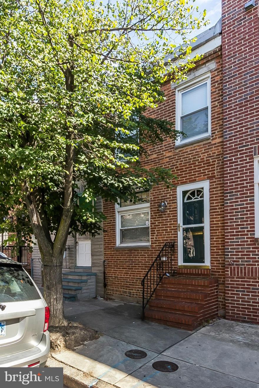 Updated  2 Bedroom 1.5 Bath rowhome in prime location 2 blocks from Canton Square. Hardwood floors, Exposed brick. Updates include  stainless steel appliances, renovated main level powder rm, new hardwood floors upstairs and in Dining Rm. Generous sized Bedrooms, both with California closets. Relax in beautiful rear yard w/tons of space for entertaining, or enjoy  your upper level deck.