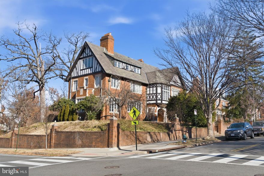 Of all the stunning Tudor Revival residences in Crestwood, this masterpiece has long been considered a star in the neighborhood.  The Grande Dame is sited on a commanding prominent position high on the corner of Decatur St. and Blagden Ave.  With approximately 7,000 square feet of interior space, the home offers six bedrooms (two with ensuite offices), four bathrooms, a powder room, a conservatory, six fireplaces and a two-car garage (with additional parking in the driveway).  The residence has been meticulously renovated and restored with an emphasis on historical preservation.  The interior offers architectural eye candy at every turn: copious original plaster moldings, original millwork, completely reworked casement windows, stunning marble and plaster fireplace mantles, and built-in benches. The kitchen with accompanying butler’s pantry is an absolute showpiece, with high-end cabinets, appliances and finishes. Outside, a large flagstone terrace is perfect for entertaining with its outdoor stainless steel kitchen and numerous spaces for al-fresco dining. Beautifully reimagined to incorporate the original elegance with modern comforts, this exceptional home awaits its new owner.