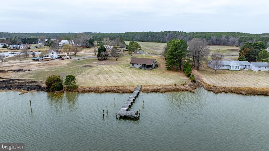 Welcome to your dream retreat nestled along the serene banks of Hudson Creek! This charming ranch-style home, built in 1987, offers 1,614 sq. ft. of inviting living space, featuring three spacious bedrooms and two full baths. Step inside to discover a warm ambiance with wood floors and cozy carpet, complemented by a formal dining room and a kitchen island perfect for gatherings. Enjoy the convenience of one floor living, including first floor laundry. Outside, a screened porch, and a deck are perfect for entertaining while soaking in the stunning views of the river and scenic vistas on 1.97 acres. With 210 feet of living waterfront, this property includes a private dock, ideal for water enthusiasts. Located on a peaceful no-thru street, this home offers both tranquility and easy access to nature. One year Home Warranty included that covers the HVAC system, all appliances, plumbing, electrical, and more. Don’t miss this opportunity to own a slice of paradise!