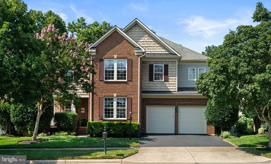 Fall in love with this beautiful home in the luxurious & lovely Lansdowne on the Potomac community - one of the most sought after neighborhoods in Loudoun County. This elegantly, just refreshed, light-filled home is over 4,500 SF of finished living space and includes 4 bedrooms and 3.5 baths. Freshly painted on all three levels, gorgeous refreshed hardwood flooring on the Main Level and new carpeting on all three levels make this home impossible to resist - it is light, bright and ready for new owners to turn the key and move right in! Updates also include:  Upper Level Air Conditioning Unit (2025); Deck Refresh (2025); Main & Lower Level AC Unit (2020); Water Heater (2020). Perfectly situated on a lovely circle of homes and backing to woods, owners will enjoy both the feeling of privacy and nature's beauty during all four seasons. The Family Room's two-story window wall and gas fireplace make it the perfect room for family gatherings or reconnecting on weeknights, weekends and holidays. Just off the Family Room is a large Bonus Room that could be used as a Main Level Office, Guest Room or Play Room - with doors that lead to the spacious deck. The Kitchen is also just off the Family Room, making it the perfect space for comfortable living and entertaining alike. Spacious granite countertops, gas cooktop, pantry and large kitchen table area provides ample gathering space. The Butler's Pantry just off the Kitchen and Dining Room is perfect for hosting more formal occasions. Looking for a cozy Formal Living Room - this one is just perfect for conversation or reading, with a lovely view of Habitat Circle. An open Upper Level landing and railing, amplifies light and offers an elegant overlook to the Family Room below and a beautiful outdoor view through the two-story window wall. The En-Suite Primary Bedroom is generously appointed with windows, light-filled and lovely. The Primary Bathroom includes a new frameless shower door and new light fixtures, as well as an elegant soaking tub. The walk-in closet adds to the spacious layout of the Primary Suite. The Upper Level includes three additional Bedrooms, two of which share a spacious Dual-Entry Full Bathroom. The refreshed Lower Level is adaptable for a variety of uses and includes a Full Bathroom. It also provides an open, versatile space ready to be customized to suit the new homeowner's lifestyle. Opening to the stone patio, fenced yard and Main Level Deck stairway, the Lower Level provides ease for all-season activities and entertaining options. An unfinished room provides the potential for finishing as a 5th Bedroom, Office, Home Gym/Sauna, Play Room or Storage Room. The large refreshed deck (that is both just off of and accessible from the Kitchen, Family Room & Office), the lovely patio and manicured lawn and garden have been cared for and maintained meticulously. Once outside and through your gate, a stroll on the walking path along Goose Creek that leads directly to the Potomac River is a must! If you love to canoe or kayak, the Riverpoint Drive Trailhead is a convenient access point approximately one half mile away. Welcome to the exceptional amenities Lansdowne on the Potomac residents enjoy! Top-Rated Schools, Easy Commuter Access to the Washington Metrorail Silverline Ashburn Station (9 miles), Major Roads, Nearby Restaurants & Shopping; Lansdowne Town Center, One Loudoun, & Downtown Leesburg. Enjoy the Potomac Club, the 30,000sf Community Center: Six-lane, 25m Heated Indoor Pool, Indoor Whirlpool, Locker Rooms, Fitness Center & Group Fitness Studio, Resort-style Outdoor Pool, Beach-Entry, Baby Pool, Fountains, Meeting Rooms, Ballroom, Game Room, Multi-age (2-12) Play Area, Outdoor Amphitheater/Free Summer Concerts, Tennis/Pickleball Courts, Sand Volleyball Court, Central Park Waterfall & Pond, Walking Trails, Events & Club. The Golf Club at Lansdowne features 45 holes across three courses.  High-Speed Internet/Xfinity Cable Television are included in the HOA fees.