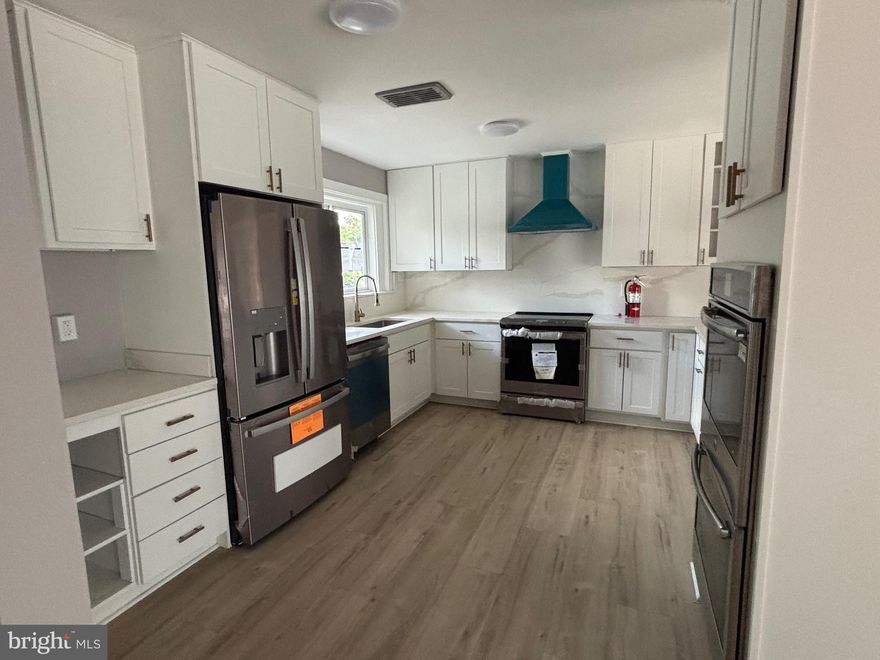 Renovated Single Family on more than 1/2 acre lot in Woodson HS District with 3000+ sq ft  finished priced under $900k ** NO HOA ** 2 driveways ** New Roof ** New Kitchen with Granite Counters & Backsplash, SS Appliances ** New Pergo Floorings throughout ** Updated Baths w/ New Ceramic Tiles, New Fixtures, Sinks etc. ** Main entry level features- 3 bedrooms and 2 full baths, Kitchen, LR/DR Combo with Fireplace and Large windows overlooking the large backyard ** Walkout Basement Features Side and Rear Entrances with High Ceilings - 4th Bed and Full Bath, Family Room with Bar Area and Fireplace, Separate Bonus Rec Room with access from 2nd driveway ** Refinished Walkways, Landscaping just completed and Freshly Painted Inside and Outside ** Mud Room,  Sidewalk, Brick Side Steps, Several newly replaced windows and much more  **