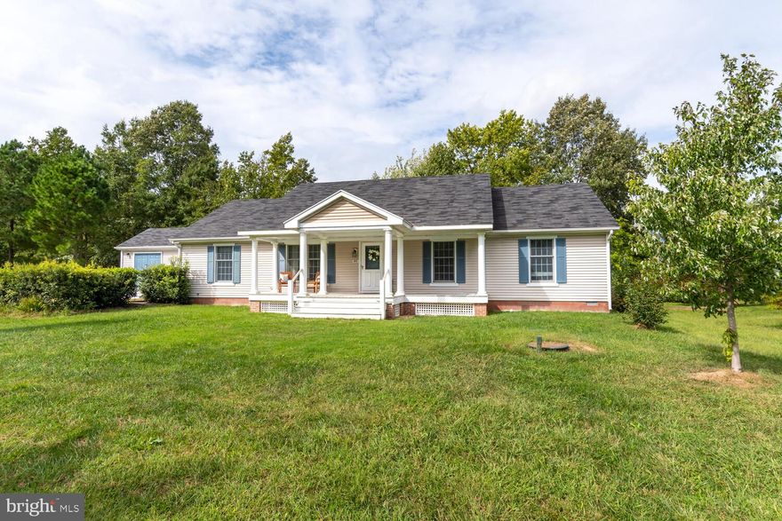 One level living in the village of Royal Oak. Roomy raised rancher provides nice open spaces that flow nicely together and allow for privacy and function. Enter through a wonderful covered front porch with nice space for seating and relaxing. Large living room opens to dining room , comfortable family room and modern kitchen with access to the back yard. There is a fabulous walk in pantry and deluxe mud / wash room with sink and great storage and attached work space with shelving as well. Primary bedroom overlooks the horse pasture and adjoins a private bath, two additional bedrooms and generously sized hall bath. Super convenient location between Easton and Saint Michaels. Serviced by County sewer, private well water and  road maintenance agreement in place.