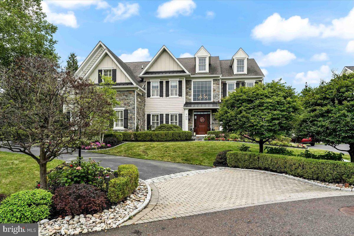 Welcome home to 2 Millview Court, a breathtaking, one of a kind 4 bedroom, 4-1/2 bath Colonial home, nestled in the highly sought-after community of The Estates At Mill Creek and Thornbury Township, situated in the blue ribbon West Chester School district. From the curb through the interior of this sensational home, every amenity and detail imaginable is present; from the custom paver driveway apron, beautiful lush landscaping, a grand stone and Hardie Plank exterior, enchanting paver and slate walkways and rear patio, beautiful custom millwork and built-ins throughout, gleaming hardwood floors, a functional & bright open floor plan, a fantastic finished lower level complete with a custom wet bar, recreation area, movie area, a home gym, a full bath and much, much more, this home is a one of a kind pleaser. Upon entering the grand towering 2-story foyer with a turned staircase, to the left is a private office with built-ins, perfect for working from home in today's environment. To the right is the formal living room with a cozy gas fireplace and formal dining room - ideal for hosting and entertaining. Continuing on is an astonishing 2-story family room with a gas fireplace , custom built in's, wall of windows plantation shutters and back stairs leading to the second floor, exquisite chefs kitchen and breakfast room with an adjacent sunroom. The first floor also features a convenient powder room and a laundry room leading to the 3-car garage. On the upper level of this fantastic home is a luxurious Master Suite with a tray ceiling, cozy sitting area and a large walk-in closet with custom closet organizers and an en suite Master Bath with an oversized soaking tub, stall shower, double sinks and a private water closet. There are 3 additional spacious bedrooms, one that has an en-suite bath and two that share a hall bath. The sensational finished basement has a custom wet bar with a wine fridge, recreation area, game area, a movie area, fitness room, a full bath, and plenty of storage as well as bilco door egress. A fabulous, private slate rear patio with a built-in stone fireplace provides outdoor living space. This home is conveniently located to shopping and restaurants and is a must see for the family looking for that special turn-key home with nothing to do but move right in and enjoy every amenity this fantastic home and community have to offer. Schedule an appointment today before its too late !!