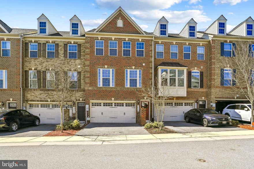 Welcome to your new stunning home in the sought-after Westside community of Laurel. This meticulously maintained 3-bedroom, 3-and-a-half-bathroom townhouse offers the space and customizing details of single-family living with the convenience of a townhome. Enter on the lower level in the foyer or the 2-car front garage. On the main living level, you’re greeted by an enormous and airy kitchen that will indulge your inner chef, featuring GE stainless steel appliances, upgraded fixtures, gorgeous granite counter tops, and 42” cabinetry. Whether you're hosting an intimate gathering or preparing a family feast, this kitchen is sure to impress! Step into a bright and airy living room that's perfect for relaxing with family and friends. The open floor plan creates a seamless flow between the living, dining, and kitchen with beautiful new luxury vinyl plank flooring. Step outside onto your 18x14 deck and immerse yourself in the serenity of nature. Retreat to one of three generous bedrooms, each offering comfort and privacy. The master suite boasts a walk-in closet and a luxurious en-suite bathroom with dual sinks, a soaking tub, and a separate shower with a seat.  Whether you're basking in the natural light streaming through the custom blinds in the living areas or enjoying a moment of relaxation in the master bathroom surrounded by the elegant plantation shutters, every corner of this home exudes an air of refined living. A finished basement provides additional living space, perfect for a home office, media room, or gym, and includes a full bath. Step outside to your private patio and enjoy outdoor dining, gardening, or simply soaking up the sun. Park with ease in your attached 2 car garage with a Tesla Charger, providing convenient access to your home.  The seller recently added a storage compartment  in the garage for additional storage. This quiet, quaint neighborhood provides convenient access to a brand-new Starbucks and Wawa as a bonus. Commuters will appreciate the easy access to major highways and public transportation, ensuring a seamless journey to any destination. Don't miss this opportunity to own a turnkey townhouse in one of Laurel's most desirable neighborhoods...WESTSIDE!