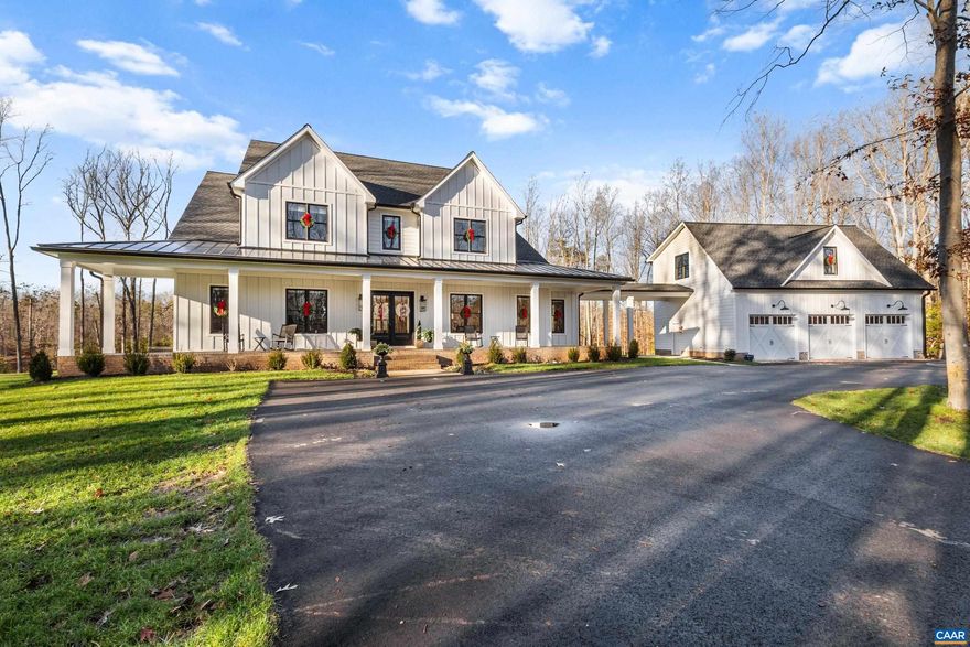 Paradise awaits in Goochland! Gorgeous custom built home on a wooded 8-acre lot w/ 500' of lake frontage and a built-in swimming pool. This custom home was built by GVA Home Builders and features almost 6,000 finished sq ft of space with a 1st level primary bedroom and a total of 5 bedrooms and 5.2 baths plus a huge 3-car garage with a rec room and gym above. This home features 10' ceilings on the main level and 9' on the 2nd level and an unfinished 3rd level for future expansion. Features include 5" white oak sand-and-finish floors, custom cabinets, Quartz/Granite countertops, all ceramic tile bathrooms, upgraded lights and plumbing, and GE Monogram Appliances. Enjoy the huge primary suite with wood floors, a to-die-for primary bathroom with a 7' x 6' shower and a 20' x 9' walk-in closet. There is also a 160 sq ft pantry with desk, ice maker, cabinets and second refrigerator. The 3-car garage is attached by a covered breezeway. Relax at the pool with unobstructed water views and enjoy almost 2 acres of sodded lawn that is fully irrigated with a 75-gallon per minute deep-drilled well. Almost forget the whole house generator and paved circular drive which delivery drivers love!,Quartz Counter,White Cabinets,Wood Cabinets,Fireplace in Family Room
