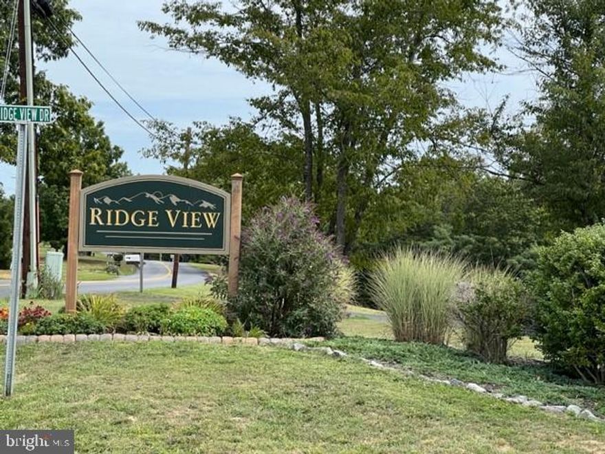 Only lot for sale in this community!
Well maintained w/ paved streets, city water, central sewage, underground utilities and  protective covenants. Ridge View is centrally located with the convenience of the schools, shopping, medical facilities  close by and the beauty of the country...and just minutes from I-70 for an easy commute.