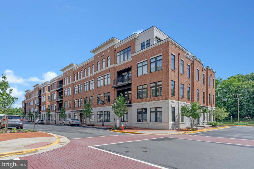 Photo of 3 Stationmaster Street SE #201, LEESBURG, VA 20175 (MLS # VALO2133328)