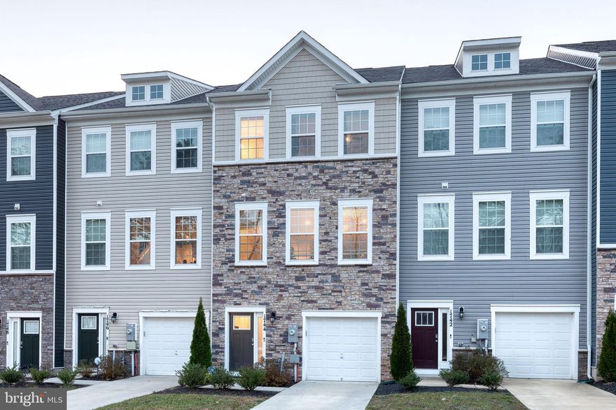 Open house cancelled! We are under contract! Exceptional Properties. Exceptional Clients. Discover this impeccably maintained, 2021-built townhome, perfectly situated just one mile from Fort Meade, the MARC Station, and Route 32. This stunning residence features 3 spacious bedrooms, 2 full bathrooms, and a convenient half bath, along with a versatile bonus recreation room on the first floor. The chef’s kitchen boasts sleek stainless steel appliances, a large island, and ample counter space, ideal for both cooking and casual dining.

The inviting living room on the second floor is enhanced by a brand-new electric fireplace and an accent wall, creating a warm, cozy atmosphere for the upcoming holiday season. Energy-efficient all-season windows help reduce utility costs, ensuring comfort year-round.

Step outside onto the quaint deck off the living room, offering a serene view of the private, fenced-in backyard—perfect for outdoor gatherings. With a one-car garage and ample guest parking, convenience is at your doorstep.

This home is truly a gem—schedule your showing today before it’s gone!