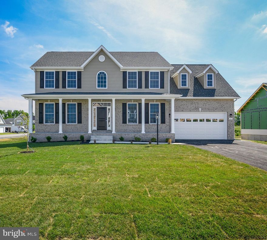 Brand new and ready to move in! You will love the quality of construction that you will find in this home. Beautiful hardwood flooring on main level. The crown molding adds an extra touch to the beauty of the home. The kitchen features upgraded glazed cabinets, kitchen island and granite counter top.  Oak steps to second level that features oak and iron railing. Master bedroom has a tray ceiling and master bath has a separate shower and tub along with double sinks and upgraded cabinetry. Lots of room to grow in the full basement with rough in for a bath.  This home is located in the well maintained Webber Springs subdivision. Preferred lender offers a $2000 credit towards closing cost.  A must see!