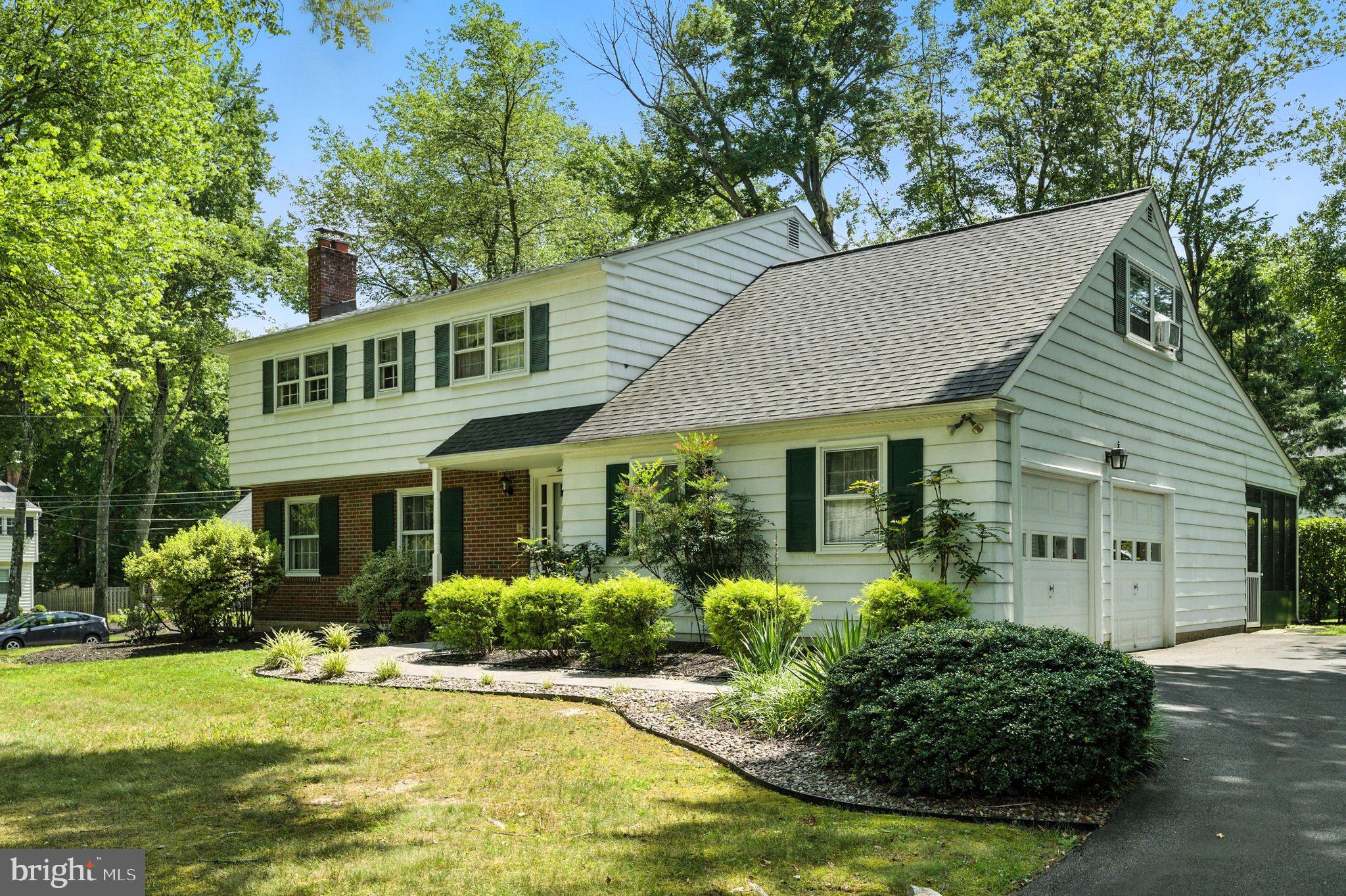 Here's something special: a lovingly maintained 5 Bed, 2.5 Bath, 2500+ft. house with central air on a large corner lot in the much sought-after Scott Glen (some say Scots Glen) community within Wallingford-Swarthmore School District. This is Nether Providence Elementary, and Strath Haven Middle and High Schools. 1ST FLOOR: ENTER into lovely vestibule with original woodwork, oak stairs and closet storage. On the left: Large Living Room with gorgeous oak hardwood floors, great natural light and fireplace with mantle. KITCHEN in the rear with granite counters, recessed lights, built-in pantry cabinet, upgraded cooktop, oven, and disposal, plenty of cabinet storage, a view to the backyard and a spacious area to the side for casual dining. Just before the kitchen there's a storage closet to keep everyday and someday things out of sight. DINING ROOM off kitchen is large, with great light, room for a long table and entertaining. FAMILY ROOM: Step down from kitchen into a cozy space with built-in bookcases, and large sliding door to the patio. The screened-in patio space is large - ready for great times when a cozy home meets the beauty of the outdoors. POWDER ROOM and LAUNDRY ROOMS: Off of the 1st floor family room there are two private areas - a charming powder room and a well placed laundry area to make life easier. 2ND FLOOR: Primary bedroom corner suite is very spacious with two closets and full bath. There are multiple other bedrooms, each with great light and views, hardwood floors, and spacious closets. The 5th bedroom is a very large flexible space with wide closet and access to an attic storage space on both sides. There's plenty of room for even a few people to work-from-home in this house comfortably. There's a full hallway bath on second floor with all ceramic fixtures and finishes. REAR & SIDE YARDS: This is a large lot, approx 1/3rd of an acre (over 15,000 sq.ft.) with tons of space for gardening, play and thoughtful landscaping for a balance of privacy, openness, light and shade. BASEMENT is large with tons of room for storage, music, or craft. Basement floor has just been recoated, walls have been repainted and there's a doorway leading to the rear yard. GARAGE: An attached spacious 2-car garage with automatic opener and plenty of room for additional storage. The house has been well maintained with updates to the kitchen in 2023, new oil tank and electrical in 2022, new roof, gutters, and windows in 2019. The house has a whole-house fan, and the HVAC system has 2 zones for greater control. This is a lovely home on a handsome corner lot in a peaceful, caring community and will not last long. Showings begin 1pm on Tuesday July 29th. *OPEN HOUSE on SATURDAY & SUNDAY August 1st & 2nd.** If the owners set a deadline for offer submission and review - that will be updated here. --Thanks--