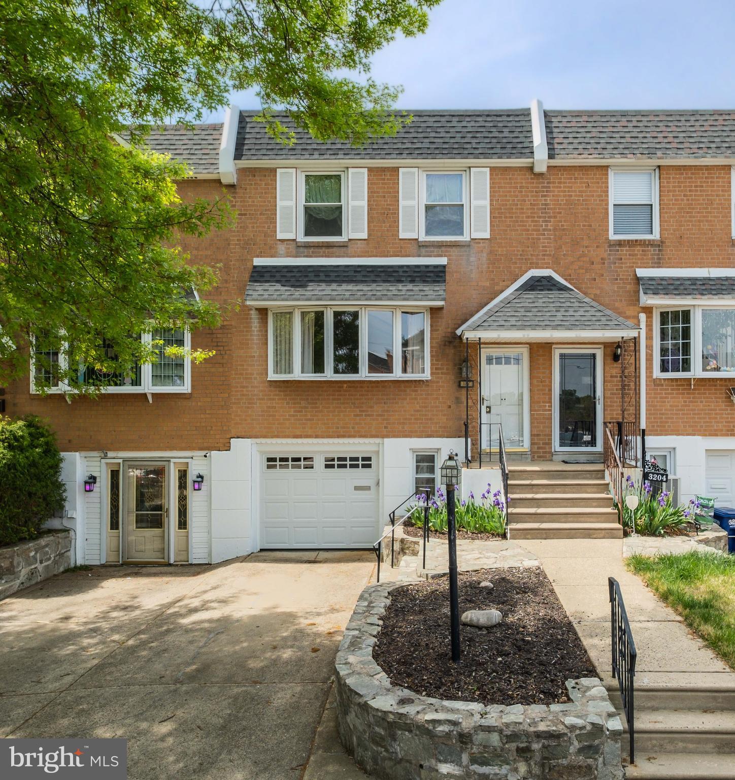 Presenting a Great opportunity for a huge row home in a prime, Northeast Philly location. 3206 Saxon Place sits on a quite Cul-de-sac, right down the street from Christ the King Church in Morrell Park. It's just minutes to both I95 and Route 1. It's also in walking distance to a playground and ball fields, and a shopping center. Plus, there's always plenty of parking on this family friendly Circle.
Inside this well kept home you'll find a wide open, Living Room / Dining room area that leads into an Eat in kitchen. It also features a convenient half bath on the main floor. Upstairs there are 3 good sized bedrooms, and a full bathroom. The primary bedroom features a private powder room. The basement has a laundry room and access to both the garage and fenced back yard. This large family home awaits your finishing touches.