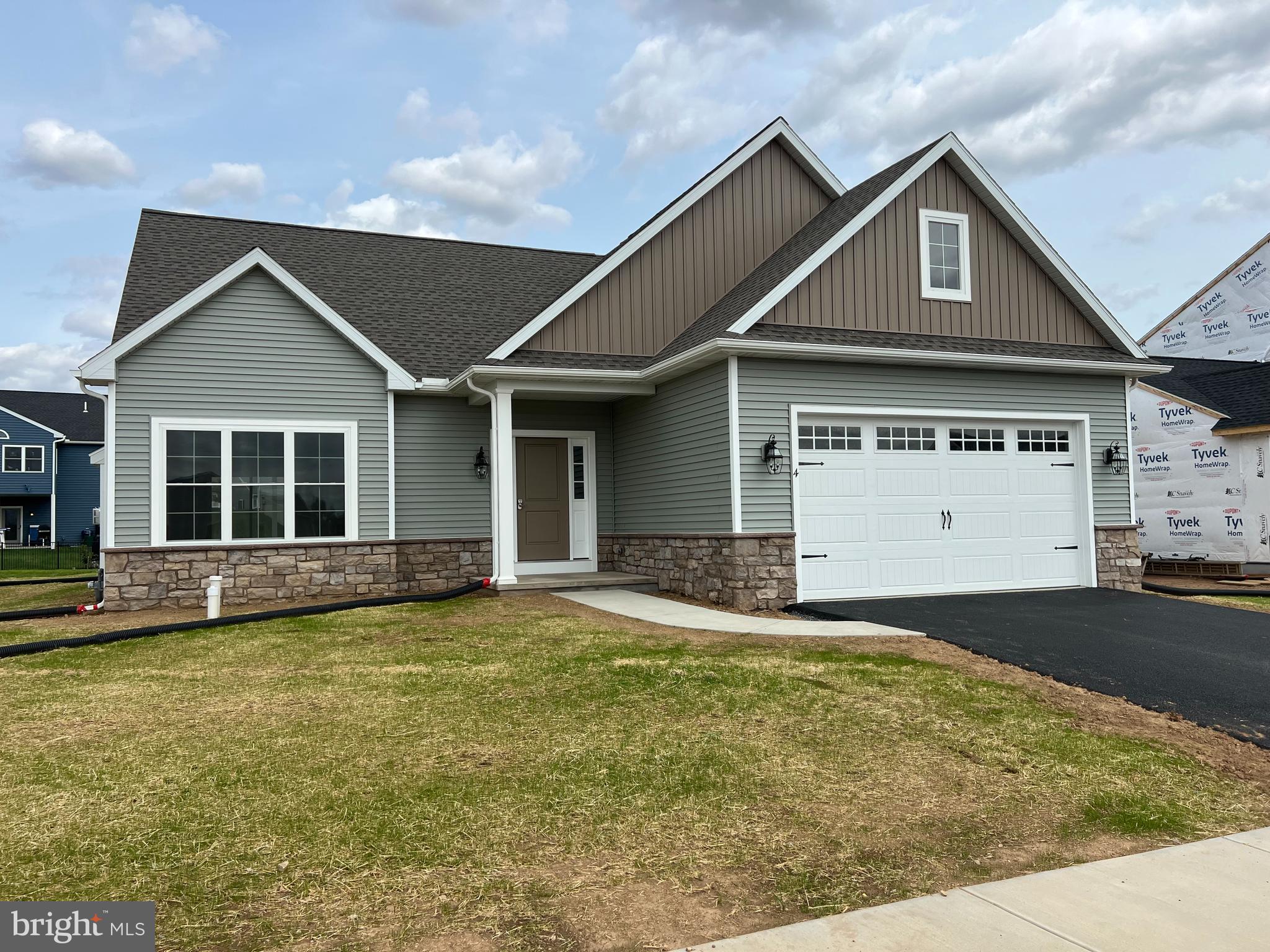 Wonderful new floorplan with Primary bedroom on first floor, large, covered patio, open floor plan, granite countertops, 9' ceilings on first floor and gas fireplace in Great room. This home is nearing completion and can be occupied in under 30 days. Builder will pay $1500 towards closing costs for using Homesale Settlements. Located in Stoneybrook development with lots of walking trails and open space.