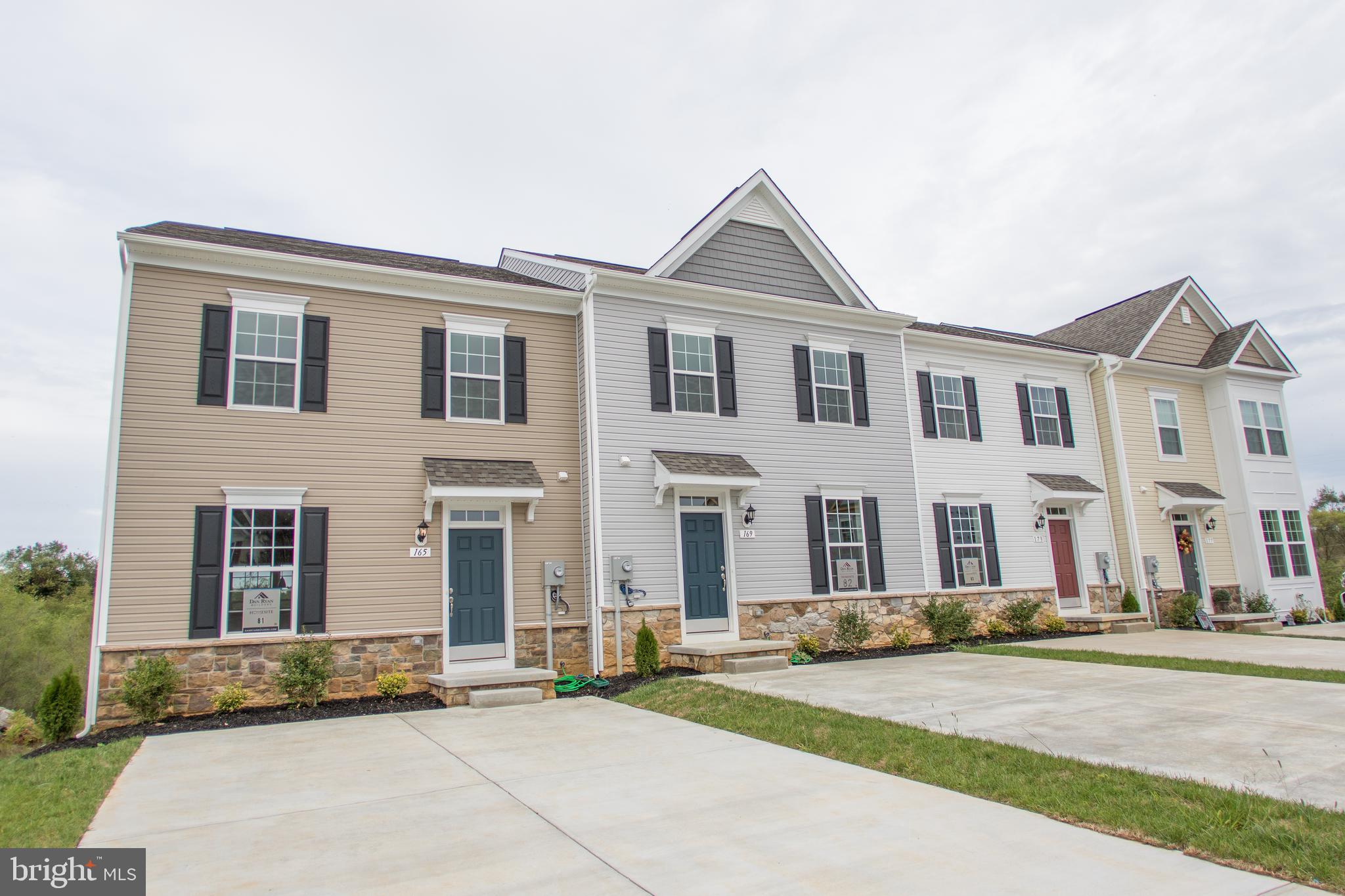 Brand new Archer II 3 Level town with main level entrance to family room and kitchen! Awesome all over with new wider floor plan - from the upgraded island kitchen with stainless appliances and gas range to the fully finished lower level rec to rooms and walk out to the yard. Maintenance free yard covered by HOA! Must see community! Don't miss out! End unit for added privacy and luxury finishes added throughout all 3 levels!