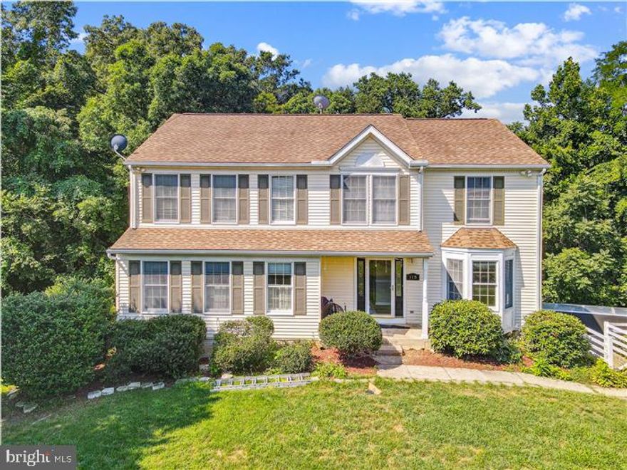 OPEN HOUSE  July 23rd 10am-12 noon!  115 Kingbrook Rd in Linthicum Heights is truly something special. Freshly painted, New Flooring and Carpets - move-in ready!! With over 4200 square feet of  space, this 4 Bedroom 4 Bath home has not one, but two screened-in porches off the back and side of the home. Enjoy the highly desirable wooded privacy this home offers and location perfection. Large primary bedroom with cathedral ceiling, sizeable bath, and walk-in closet. The main level enjoys an open floorplan for kitchen with a dining area, Living room, breakfast area, and fireplace. Additional exciting features on this level include a full theater room, formal dining room, and living room that can easily be used as home office(s) or for homeschooling.  Enjoy the massive wrap-around deck for relaxing, grilling, and entertaining. The partially finished daylight basement has inside and PRIVATE access. The attached garage includes one oversized (tall)  bay for potential RV or Boat and trailer. Convenient location easily accessed BWI airport and all surrounding corporations without the noise of the direct flight path unless occasional weather adjustments. Seconds to all major highways and major employers including Fort Meade. This one is a MUST SEE!