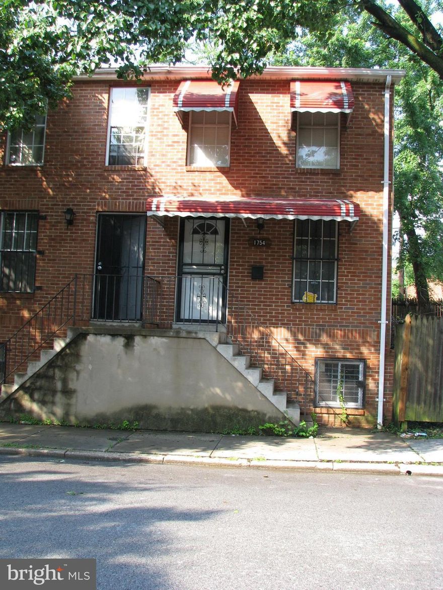New price! End of group 3 bedroom 2 Bath Brick Townhome with newly installed beautiful wood floors, newly renovated kitchen, finished lower level, Central AC, washer and dryer, fenced yard, and security doors.  Home is freshly painted, and move in ready.  Application fee is $50 per tenant.