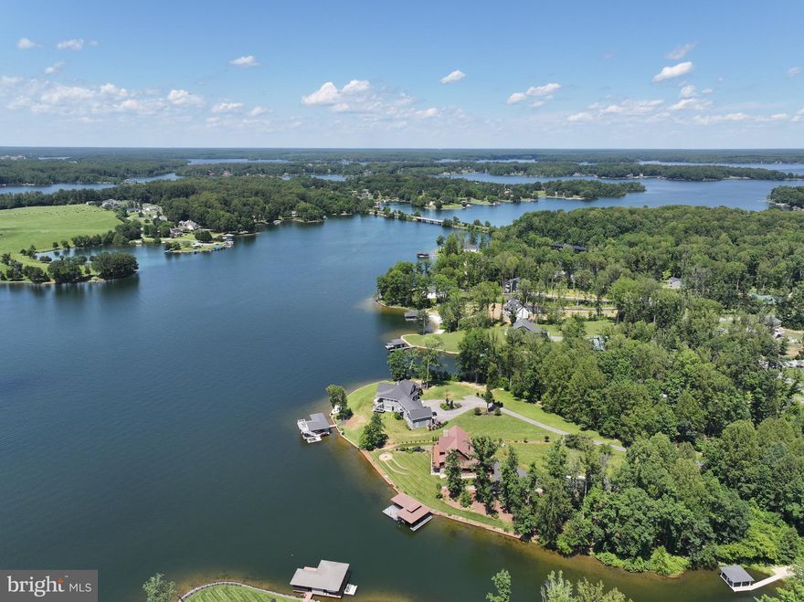 Amazing opportunity to own a waterfront lot on a quiet cul-de-sac. This property includes a covered boat slip in the common area, as well as an approved plan for a boathouse with a screened porch for you to enjoy life on the water. The lot has approved drain field, engineering, and soil work already completed. Ready for your new home with an option to use our existing plans or create your own custom design. Larson Custom Homes has a permit-ready plan. Build your home for the summer of 2026.
House (with sitework) prices start in the mid $600,000s.

Mill Run offers the best of the best in common area amenities and community living, with short-term rentals approved by the HOA. Located on the private side of Lake Anna and tucked among trees at the end of a cul-de-sac, this lot offers the perfect balance of lake life and wooded privacy.

Don’t miss the opportunity to explore this beautiful waterfront lot. Private tours are available through your local Lake Anna agents, and model homes in the community are open for viewing.